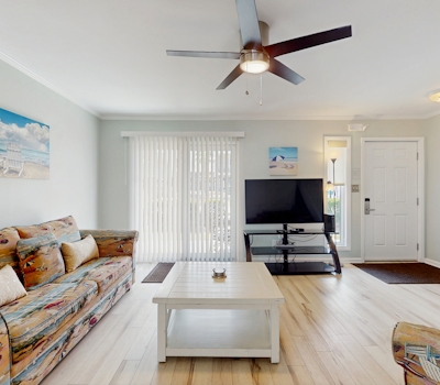 2-story townhouse with 2 balconies & patios, pool access, fast WiFi, AC