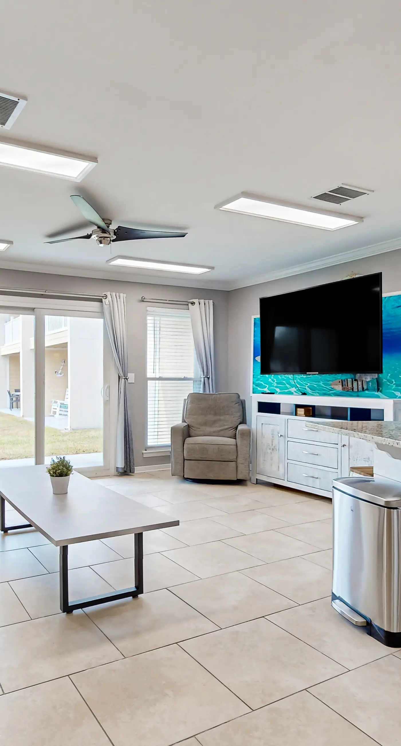 Ground-floor beach condo w/ a full kitchen, shared saltwater pool, & playground