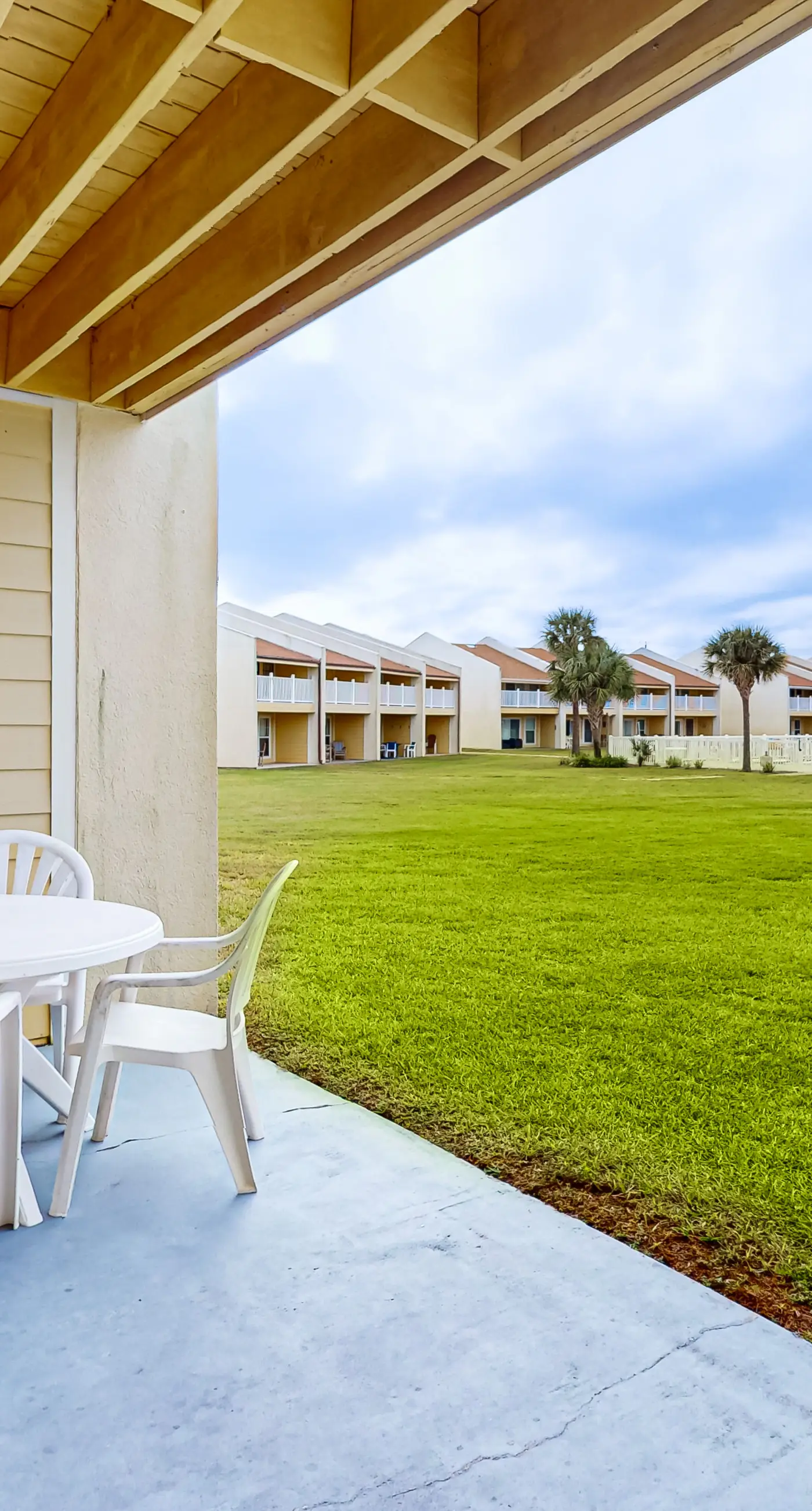 Ground-floor beach condo w/ a full kitchen, shared saltwater pool, & playground