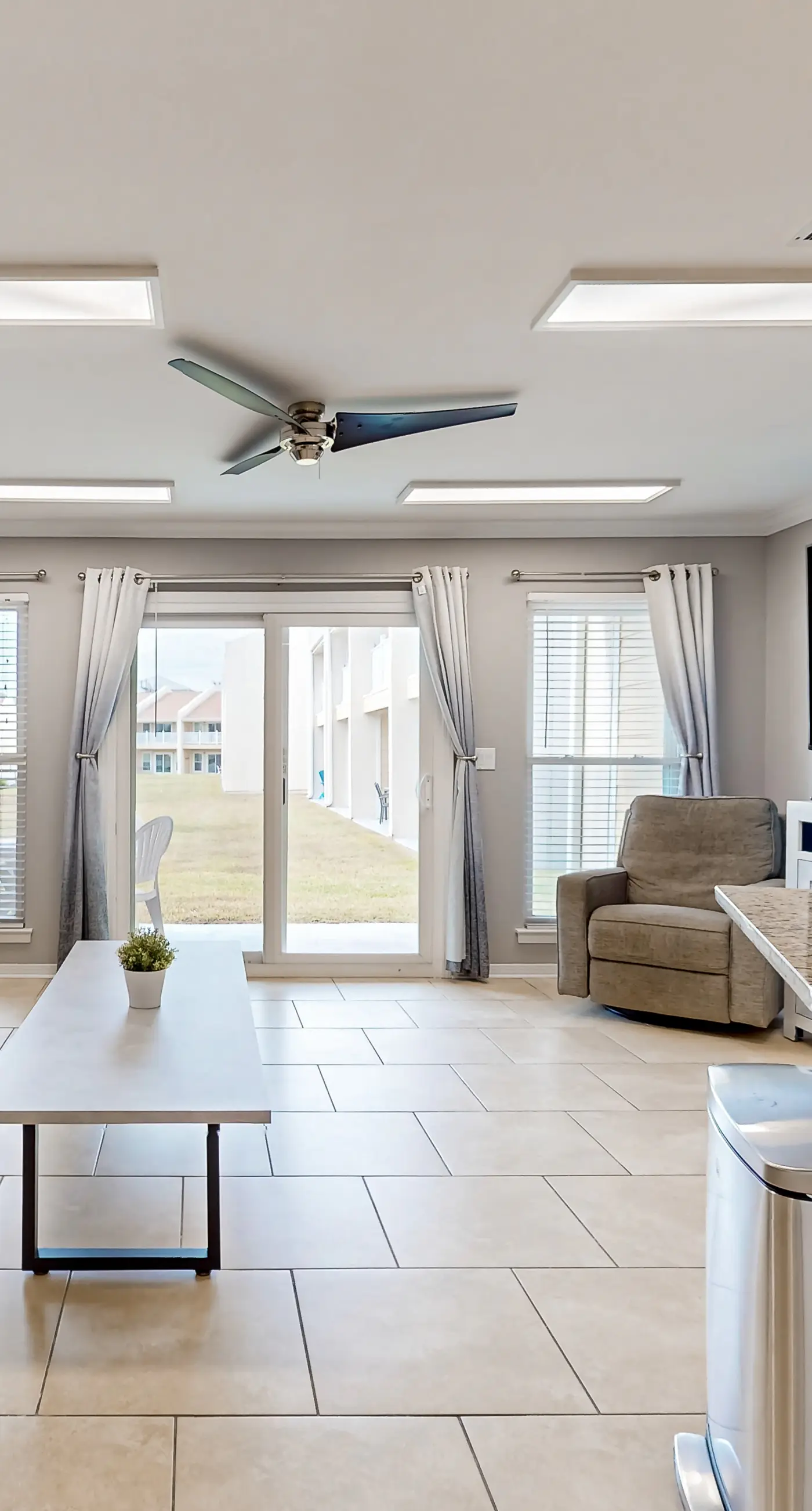 Ground-floor beach condo w/ a full kitchen, shared saltwater pool, & playground