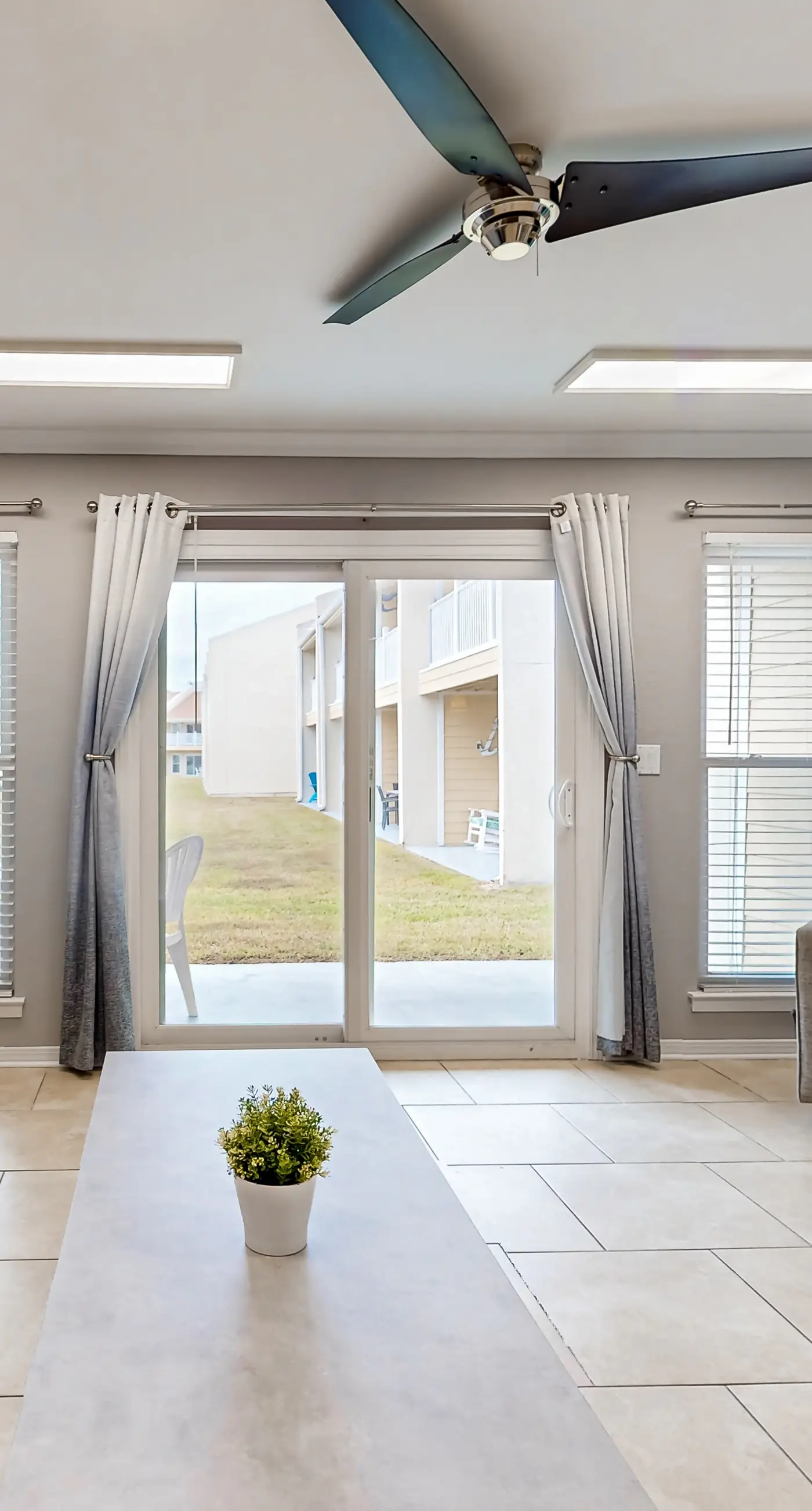 Ground-floor beach condo w/ a full kitchen, shared saltwater pool, & playground