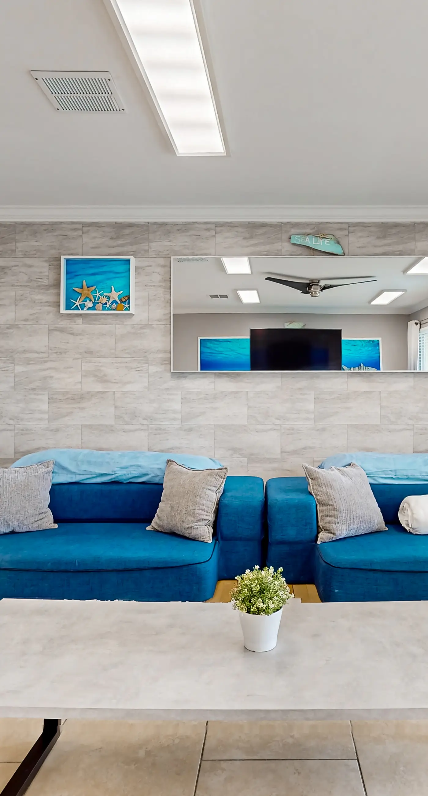 Ground-floor beach condo w/ a full kitchen, shared saltwater pool, & playground