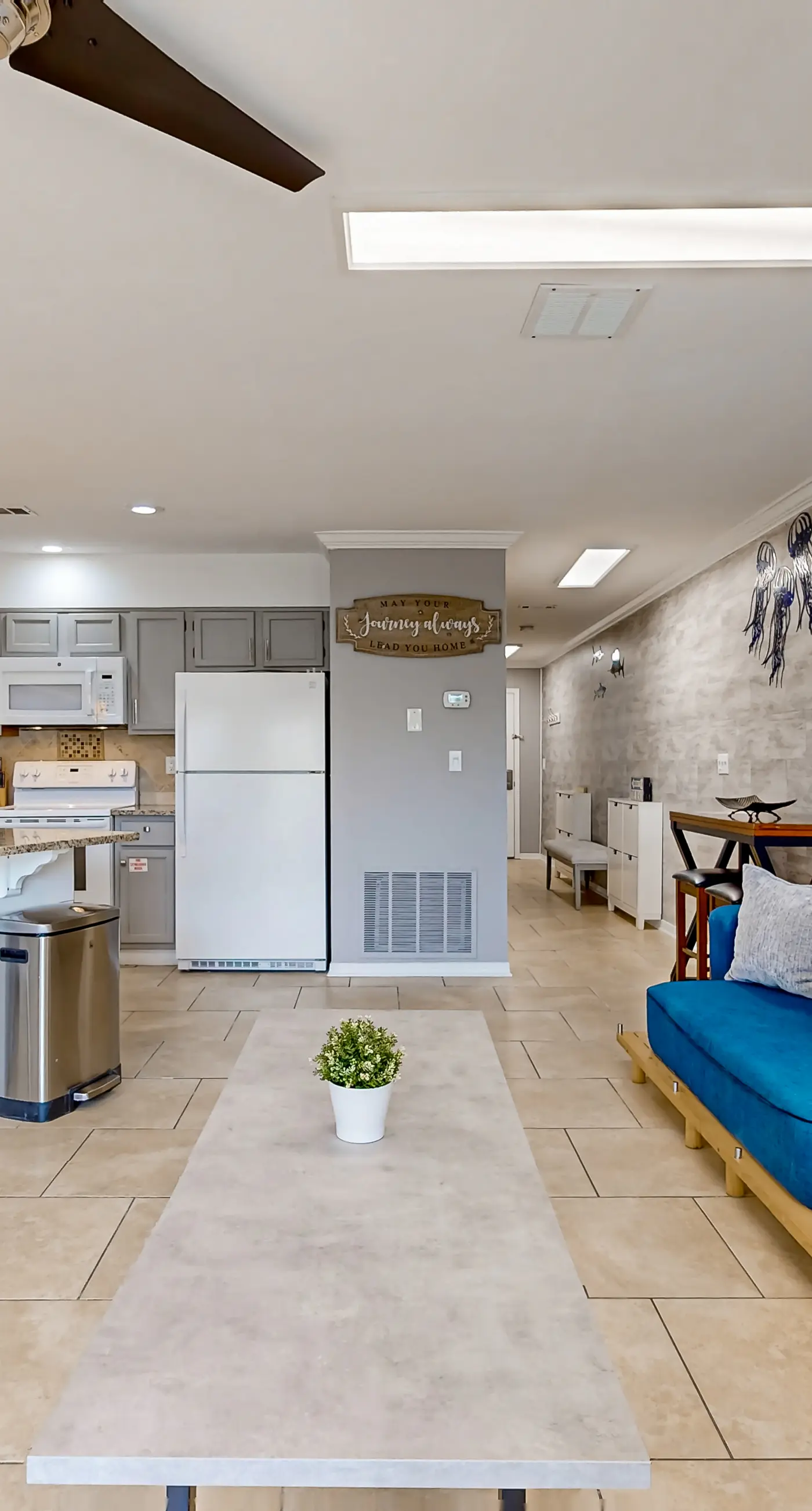 Ground-floor beach condo w/ a full kitchen, shared saltwater pool, & playground