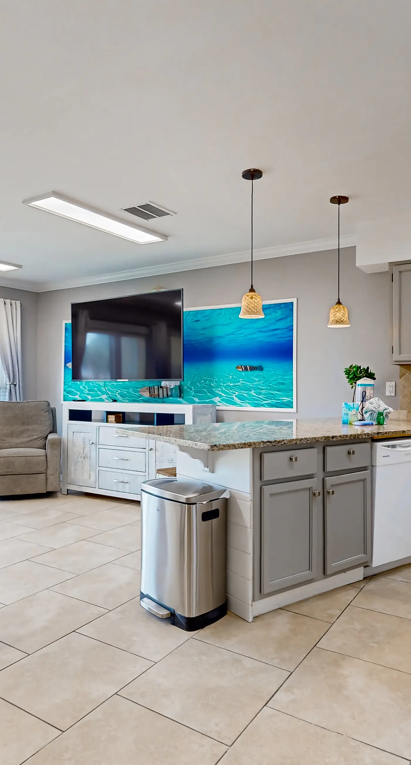 Ground-floor beach condo w/ a full kitchen, shared saltwater pool, & playground