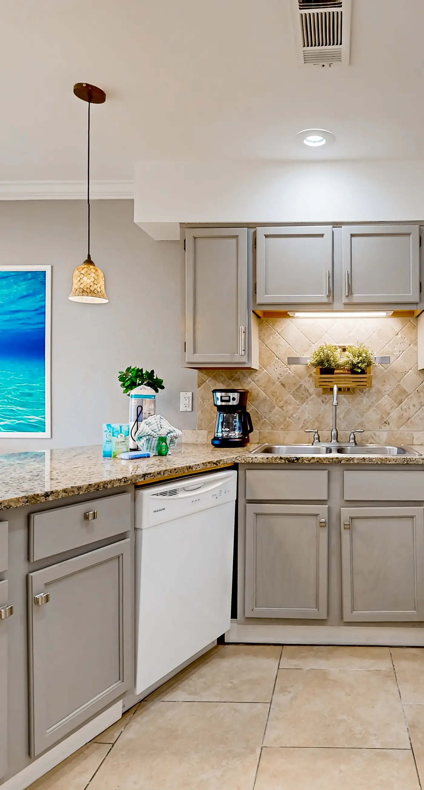 Ground-floor beach condo w/ a full kitchen, shared saltwater pool, & playground