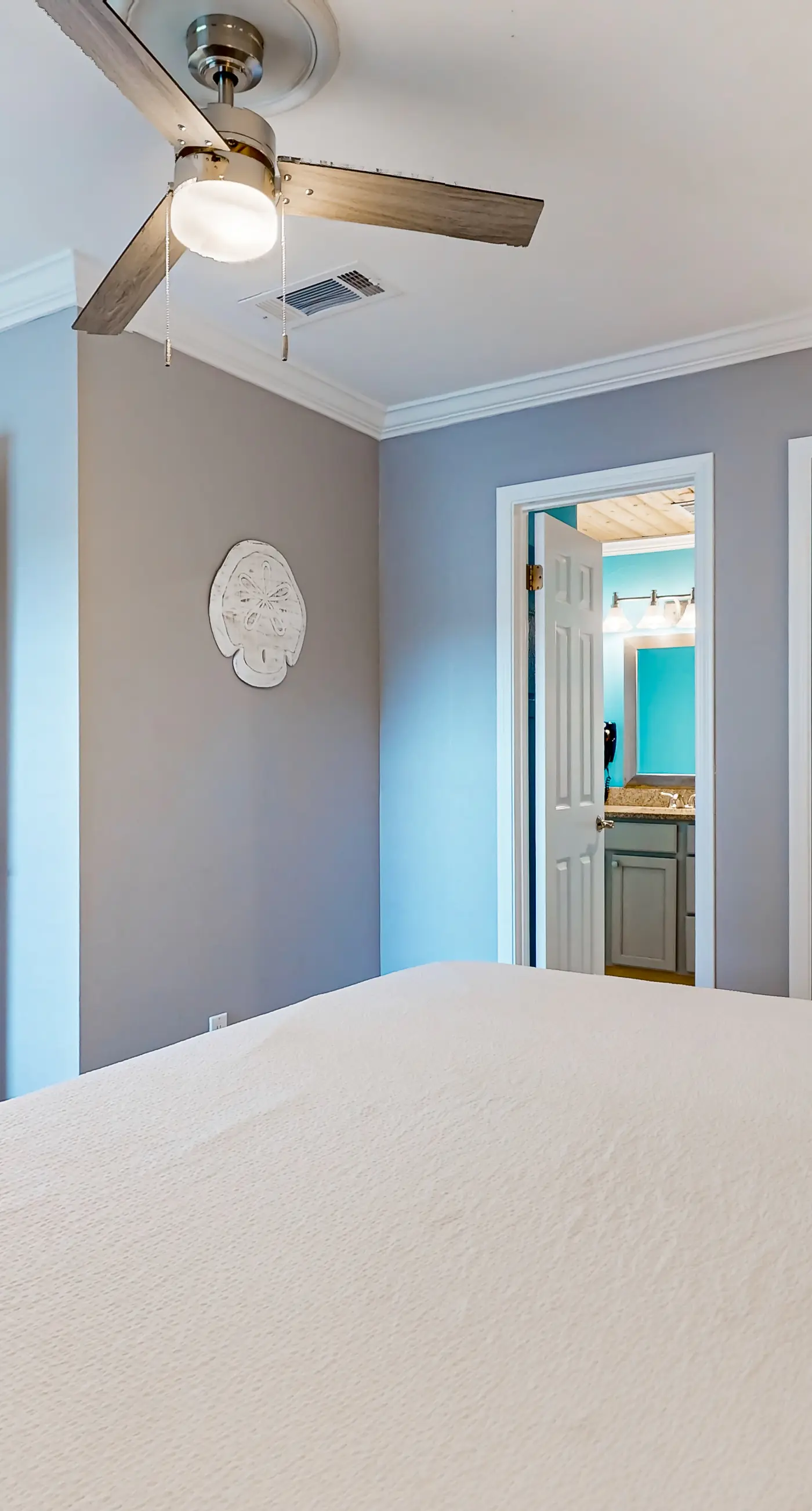 Ground-floor beach condo w/ a full kitchen, shared saltwater pool, & playground