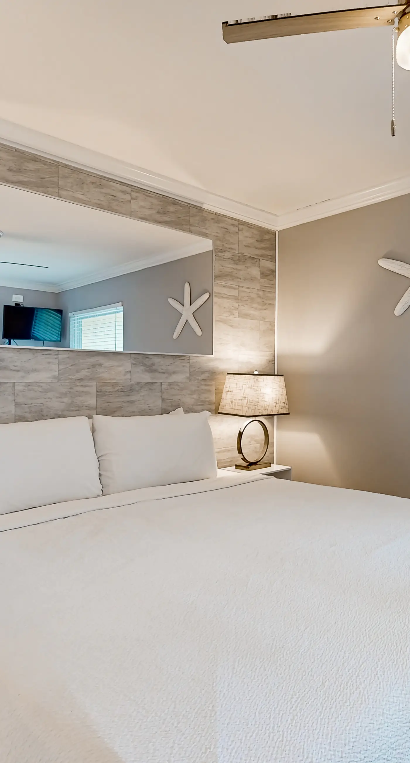 Ground-floor beach condo w/ a full kitchen, shared saltwater pool, & playground