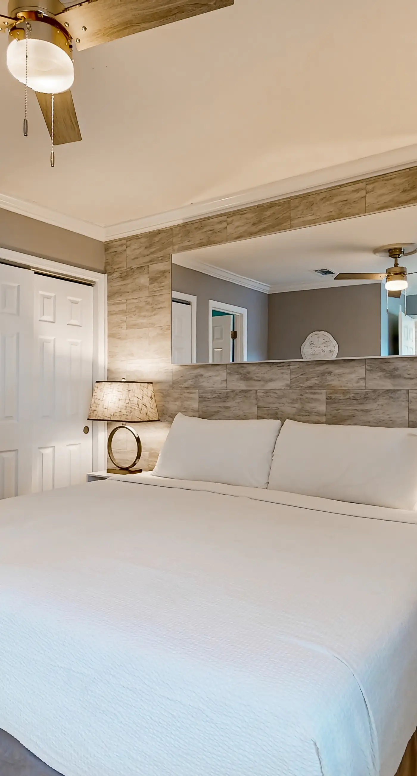 Ground-floor beach condo w/ a full kitchen, shared saltwater pool, & playground