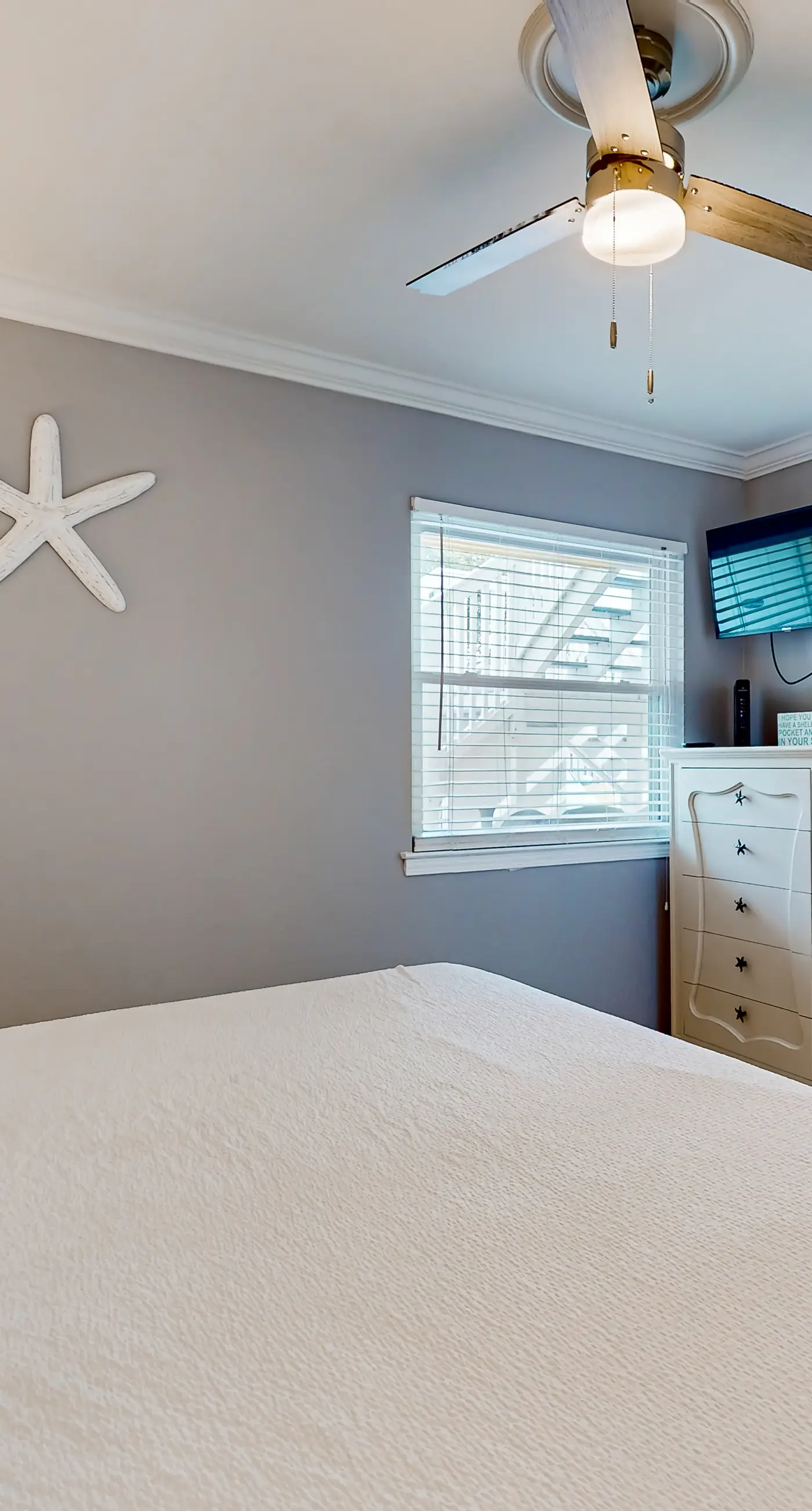 Ground-floor beach condo w/ a full kitchen, shared saltwater pool, & playground