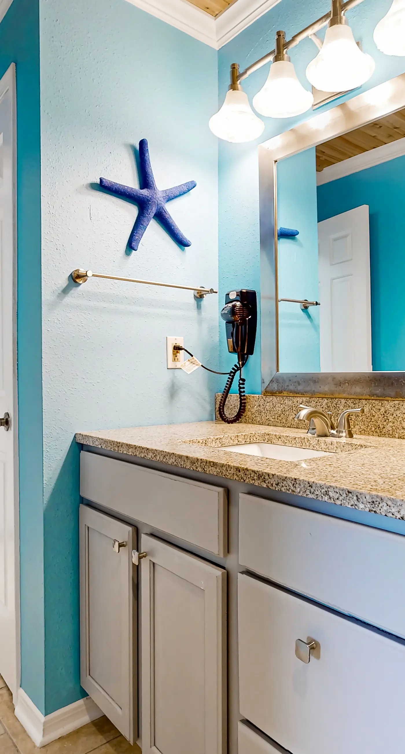 Ground-floor beach condo w/ a full kitchen, shared saltwater pool, & playground