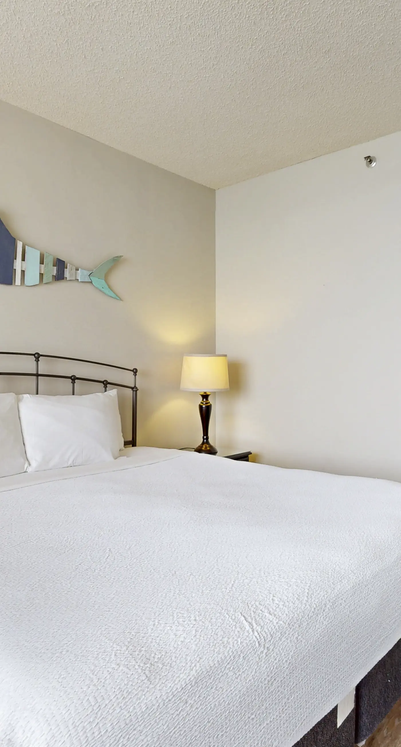 Cozy beachfront condo with shared pool and easy beach access