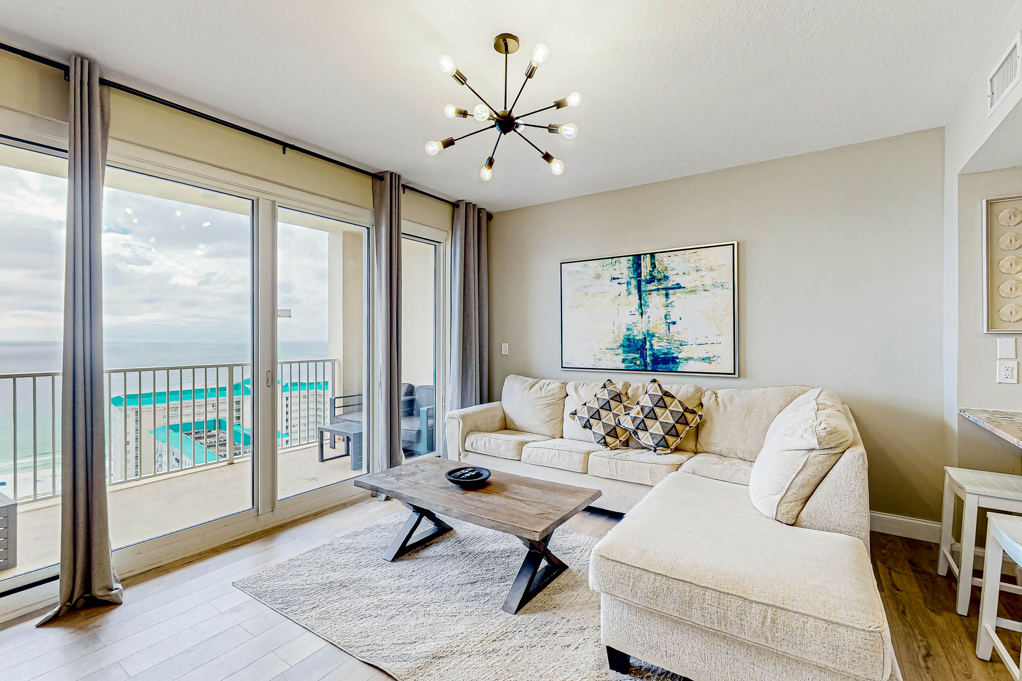 21st-floor ocean-view condo with pools, balcony, gym, washer&dryer, & central AC