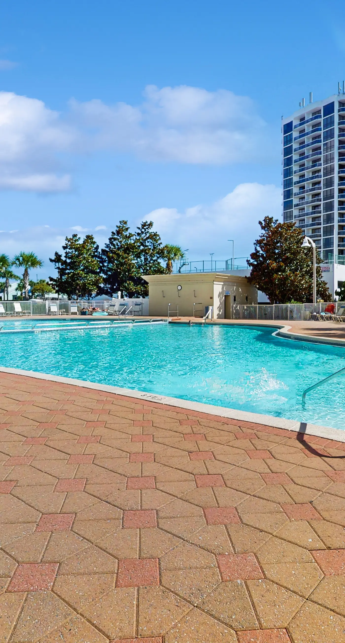 9th-floor ocean-view condo near beach with heated outdoor pool, gym, balcony