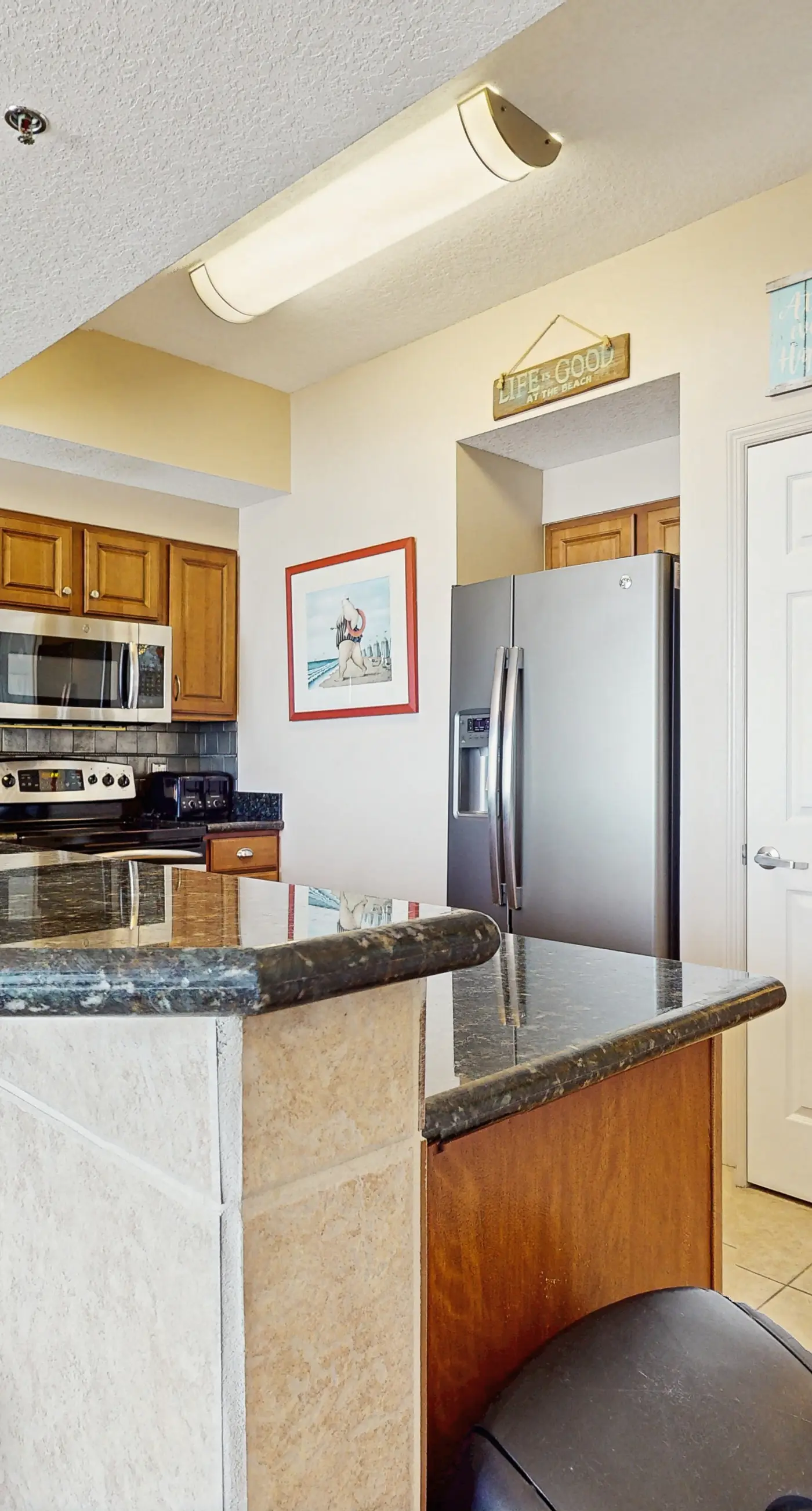 9th-floor ocean-view condo near beach with heated outdoor pool, gym, balcony