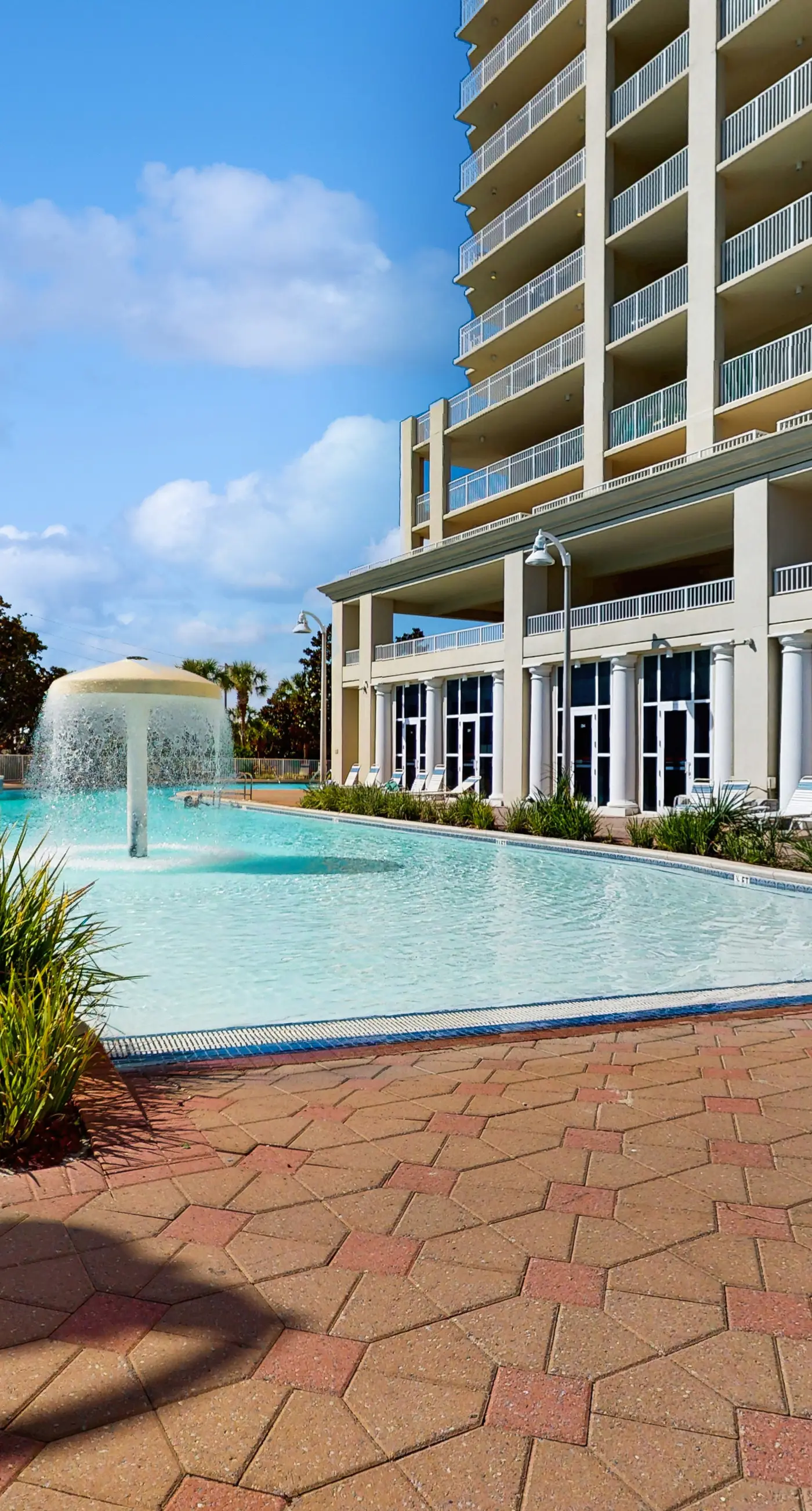 9th-floor ocean-view condo near beach with heated outdoor pool, gym, balcony