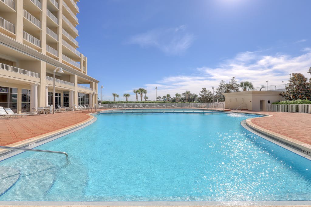 Experience the ultimate beach getaway at Ariel Dunes II 2206 in beautiful Miramar Beach. This charming one bedroom apartment offers stunning sea views and effortless beach access, making it the perfect retreat for families or couples. Guests can enjoy premium resort amenities including a outdoor pool, a fitness center, and a sauna, all while being just steps away from world class golf courses and local shopping. Whether you are looking to relax by the water or explore nearby museums and water parks, this single level home provides a comfortable and convenient base for your Florida vacation.