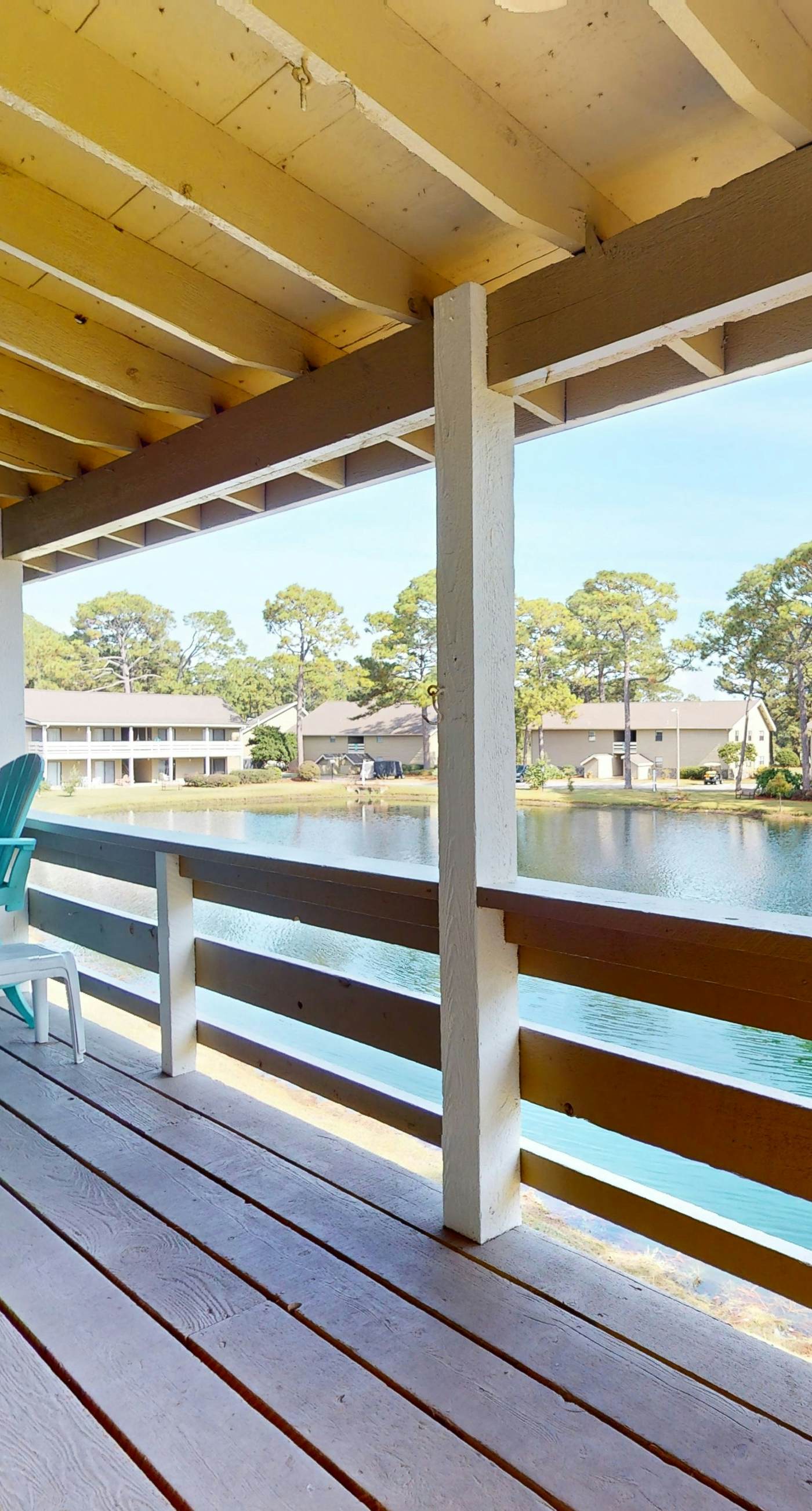 Lakefront condo with on-site golf, pool access, tennis, gym, & balcony
