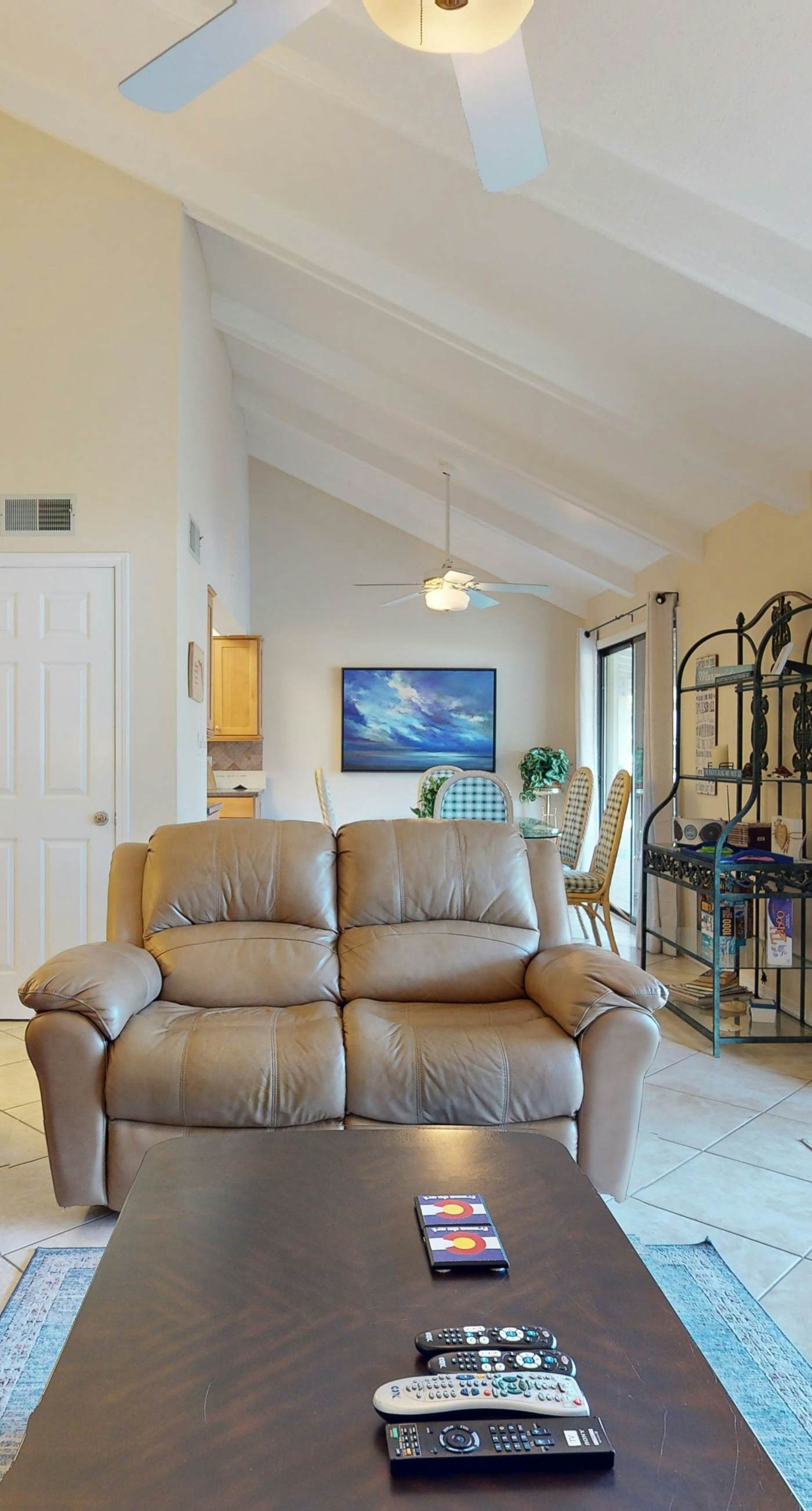 Lakefront condo with on-site golf, pool access, tennis, gym, & balcony