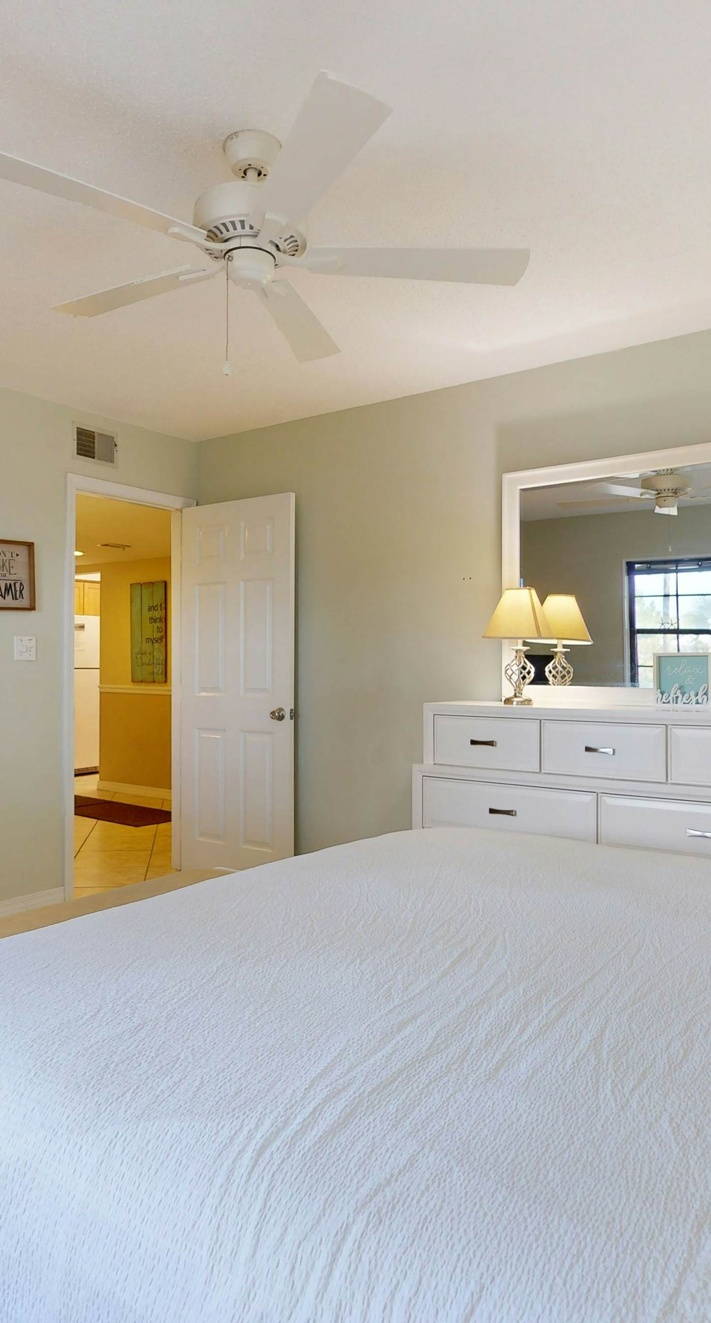 Lakefront condo with on-site golf, pool access, tennis, gym, & balcony