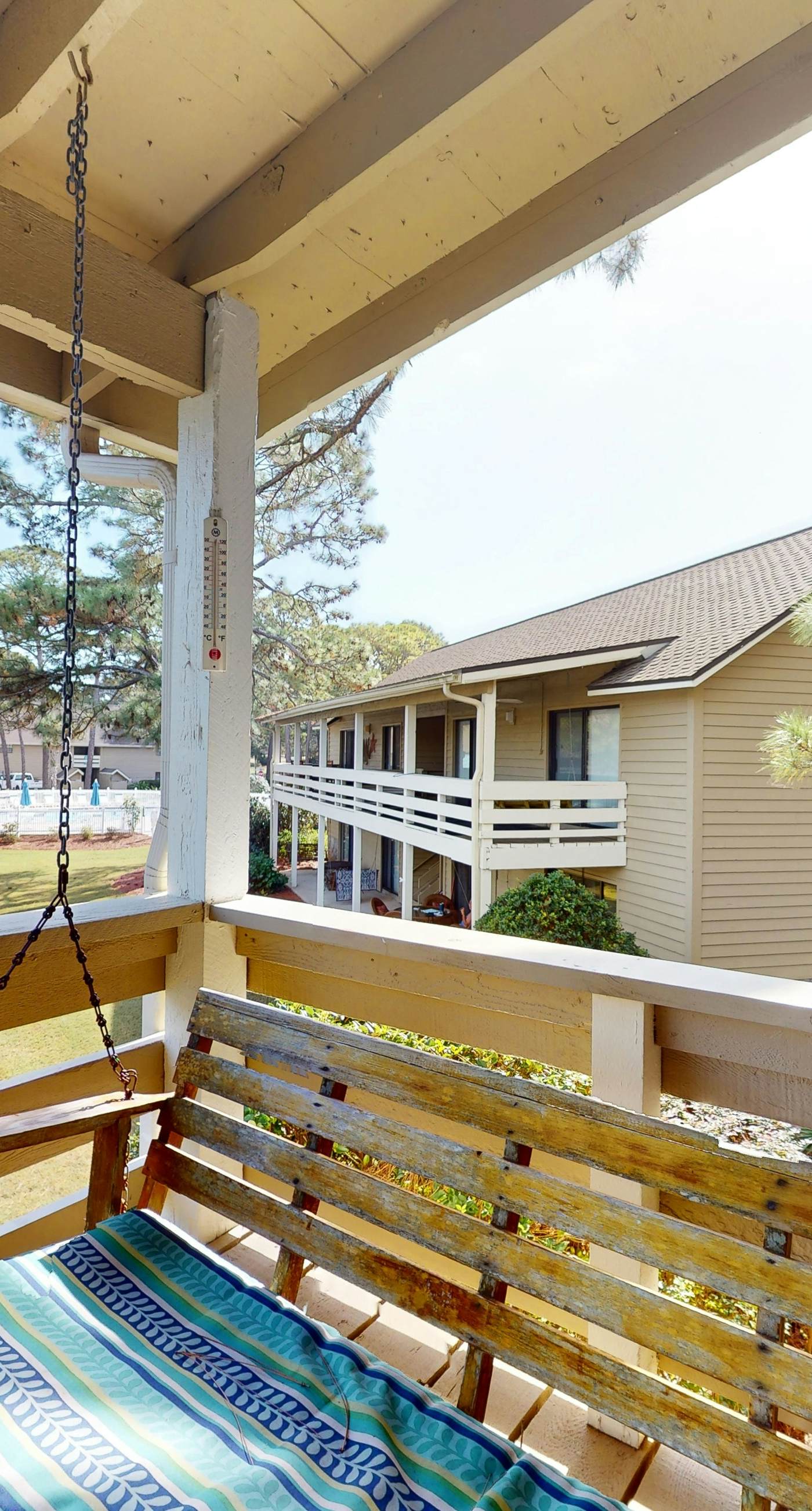 Lakefront condo with on-site golf, pool access, tennis, gym, & balcony