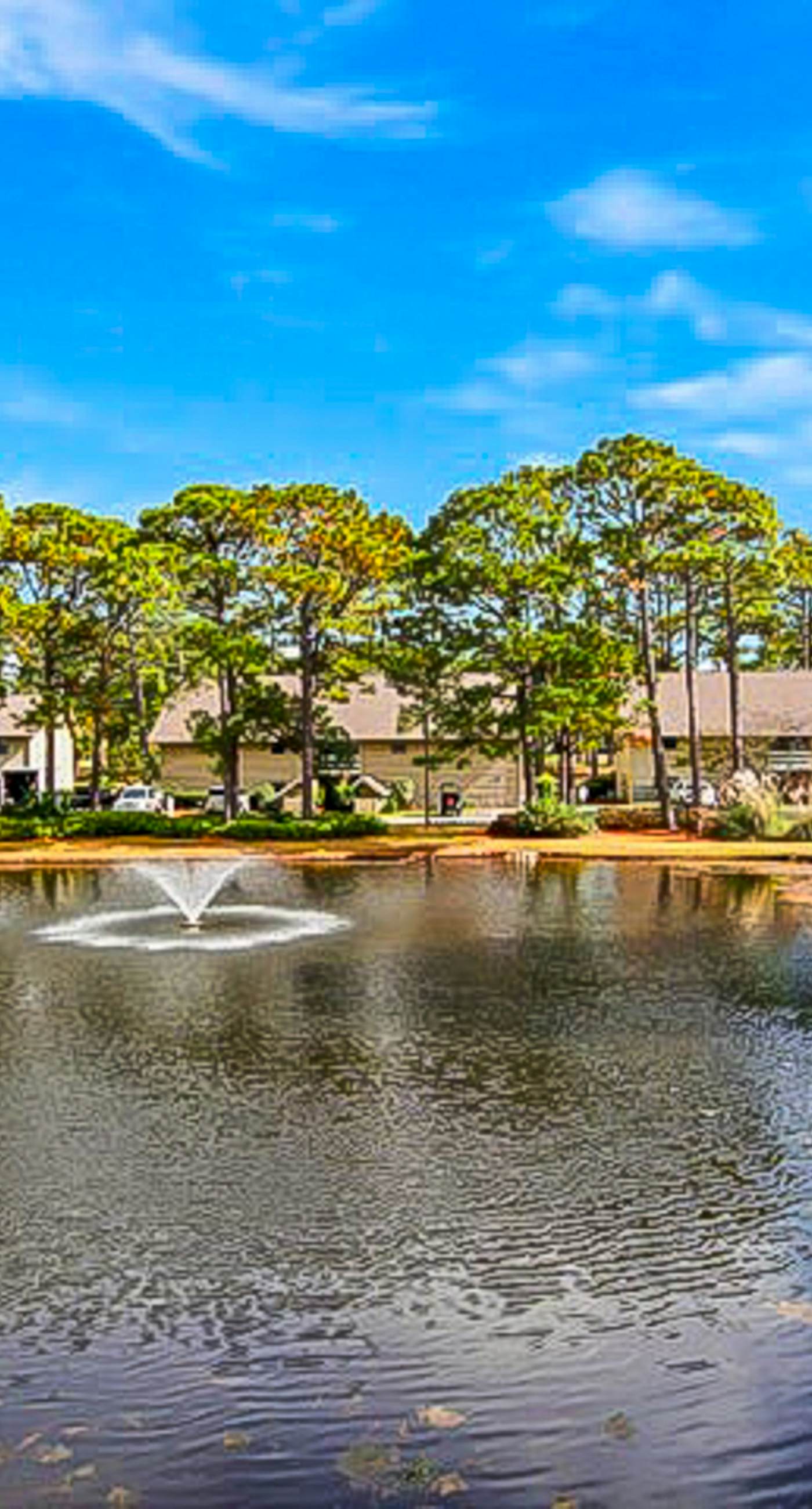 Lakefront condo with on-site golf, pool access, tennis, gym, & balcony