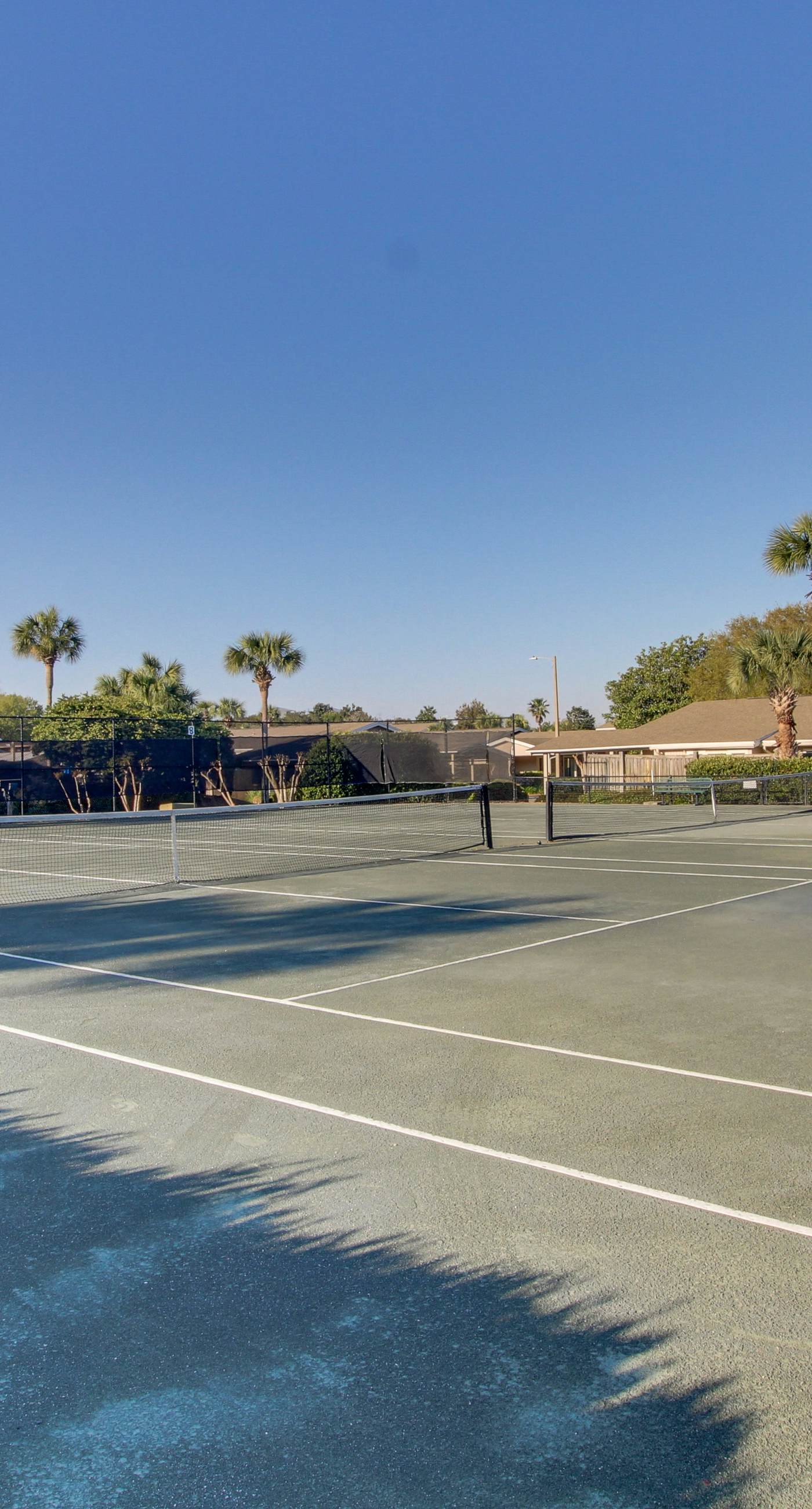 Lakefront condo with on-site golf, pool access, tennis, gym, & balcony