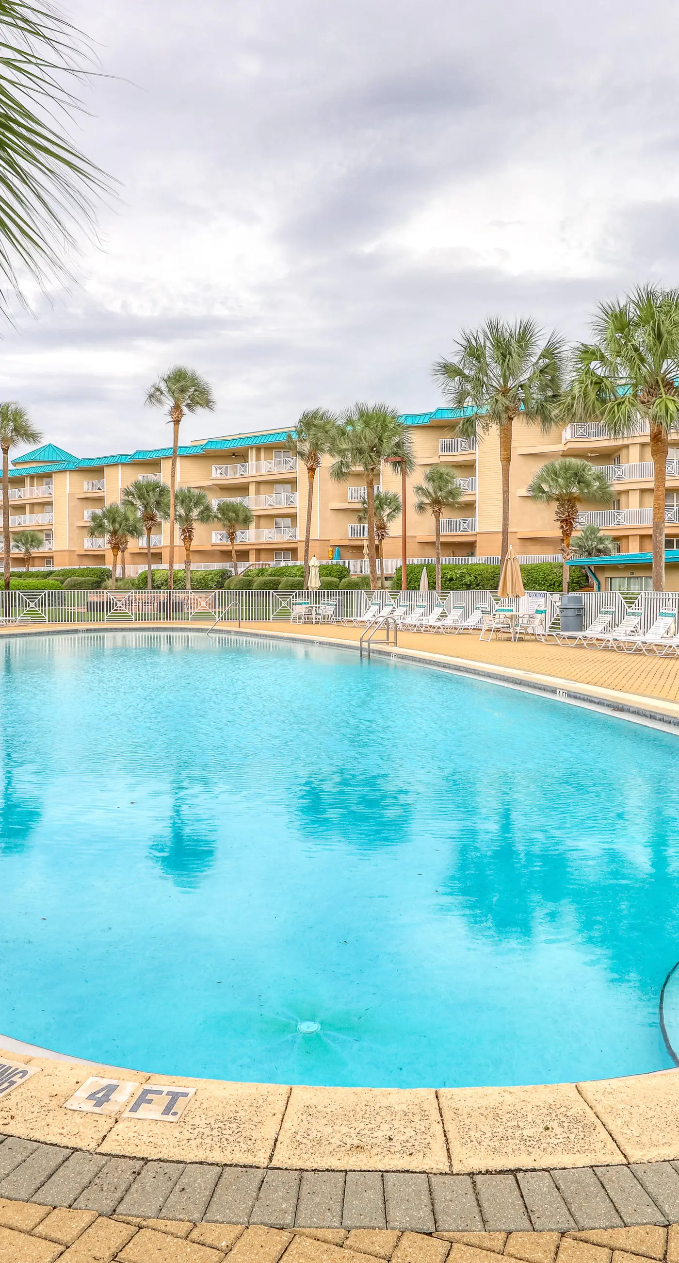 Gulf-view condo near beach with balcony, W&D, pool, gym, & WiFi - snowbirds OK