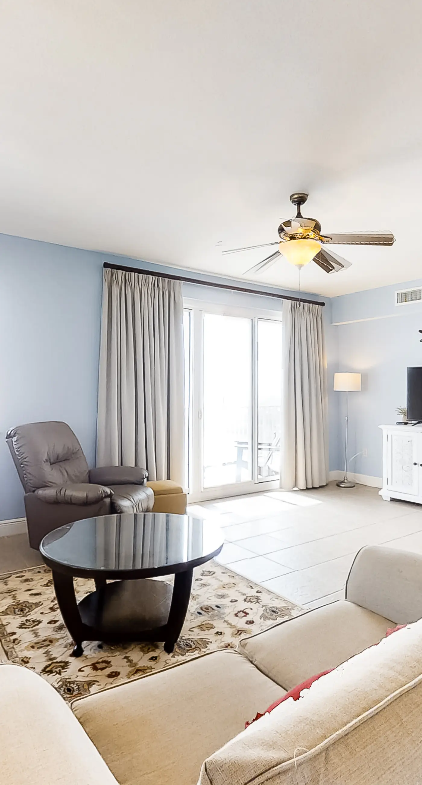 Spacious 18th-floor condo with furnished balcony, shared heated pool, gym, & more