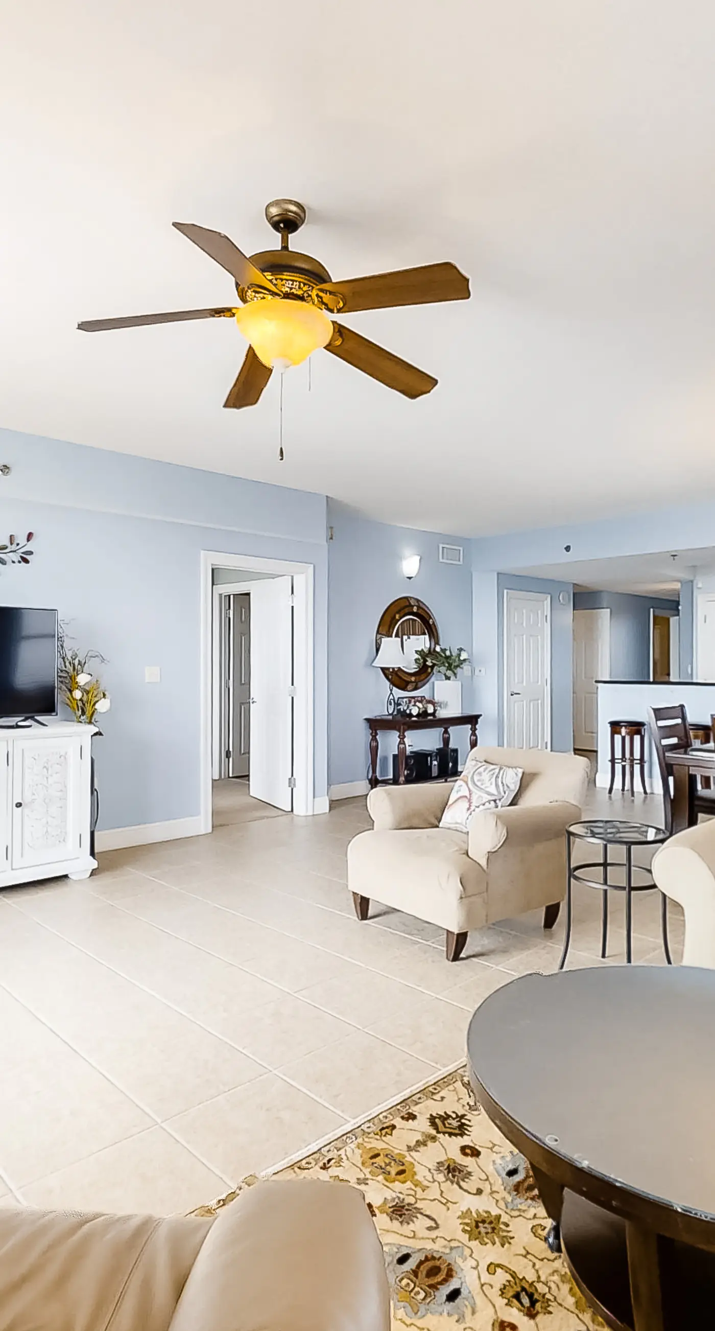 Spacious 18th-floor condo with furnished balcony, shared heated pool, gym, & more