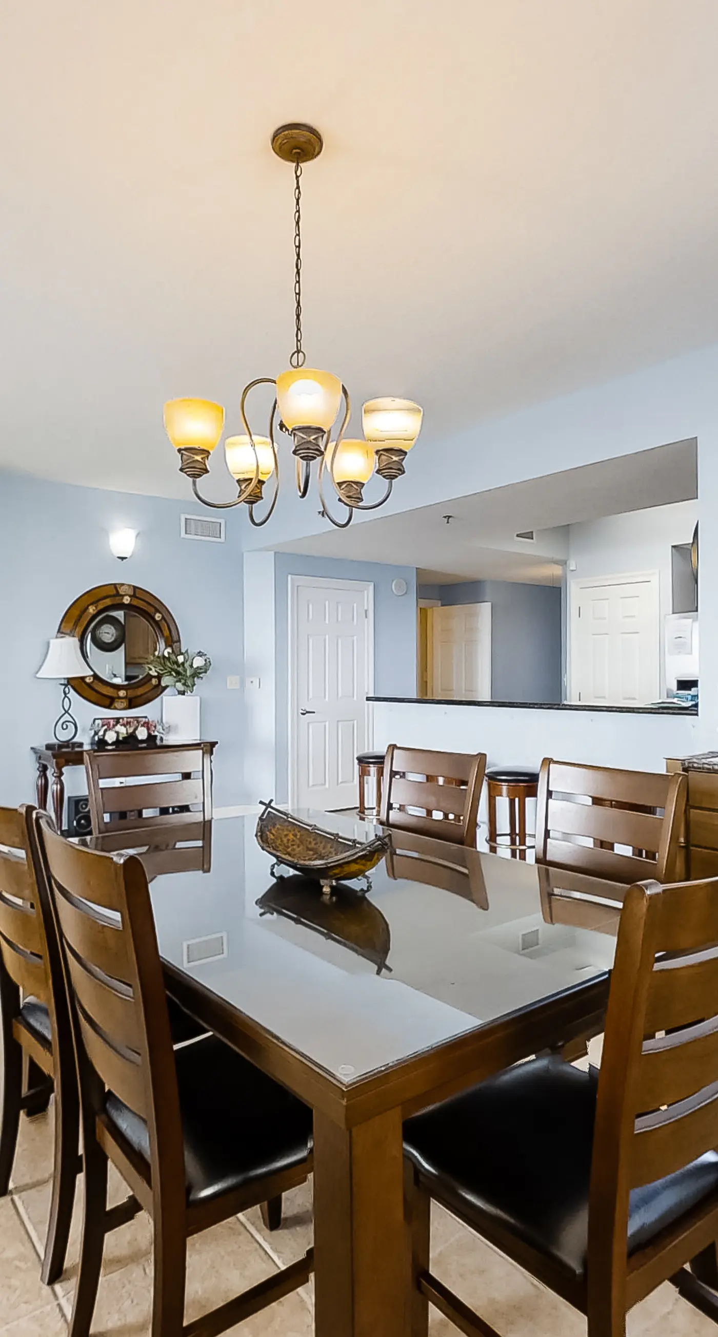 Spacious 18th-floor condo with furnished balcony, shared heated pool, gym, & more