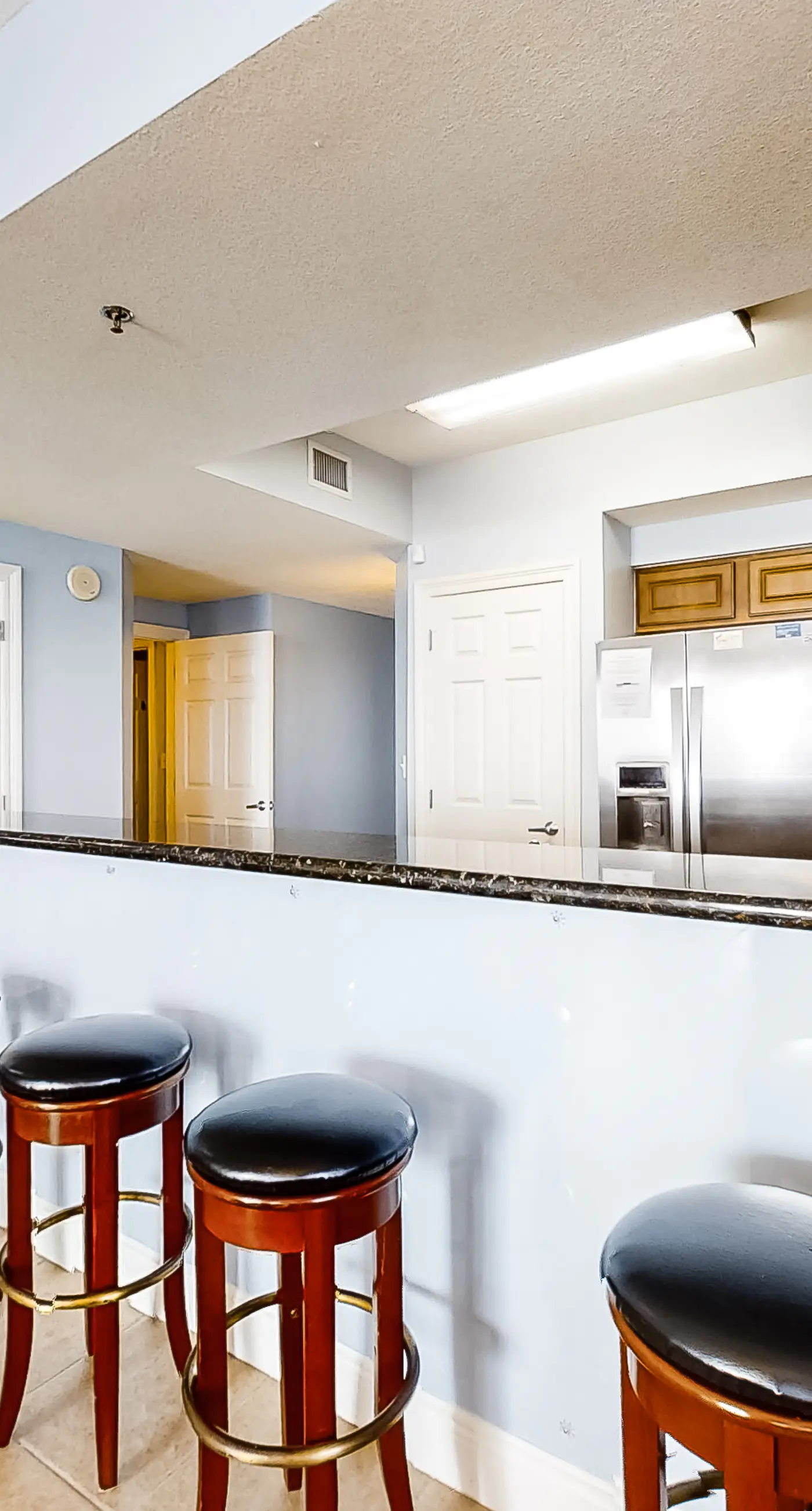 Spacious 18th-floor condo with furnished balcony, shared heated pool, gym, & more