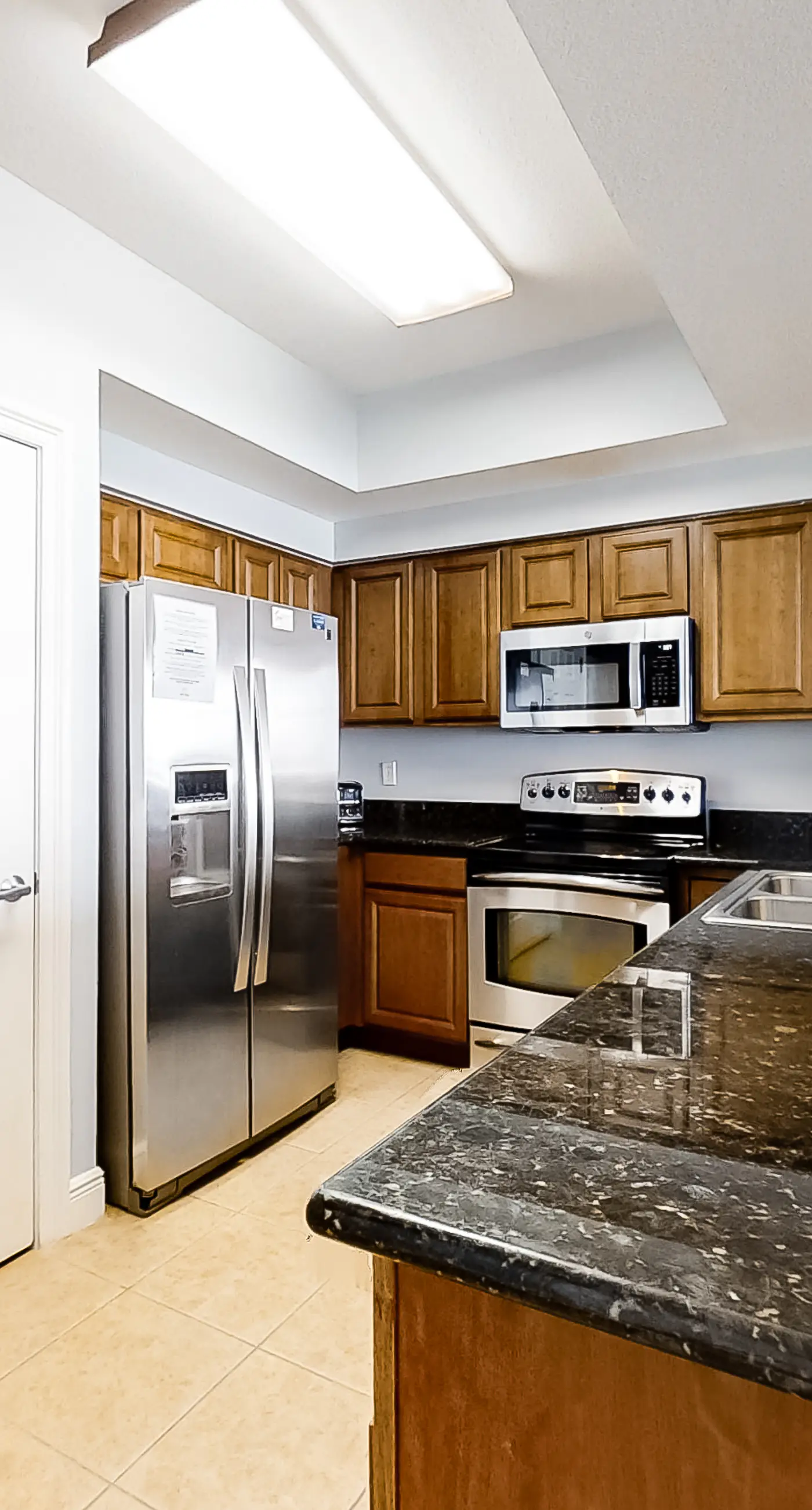 Spacious 18th-floor condo with furnished balcony, shared heated pool, gym, & more