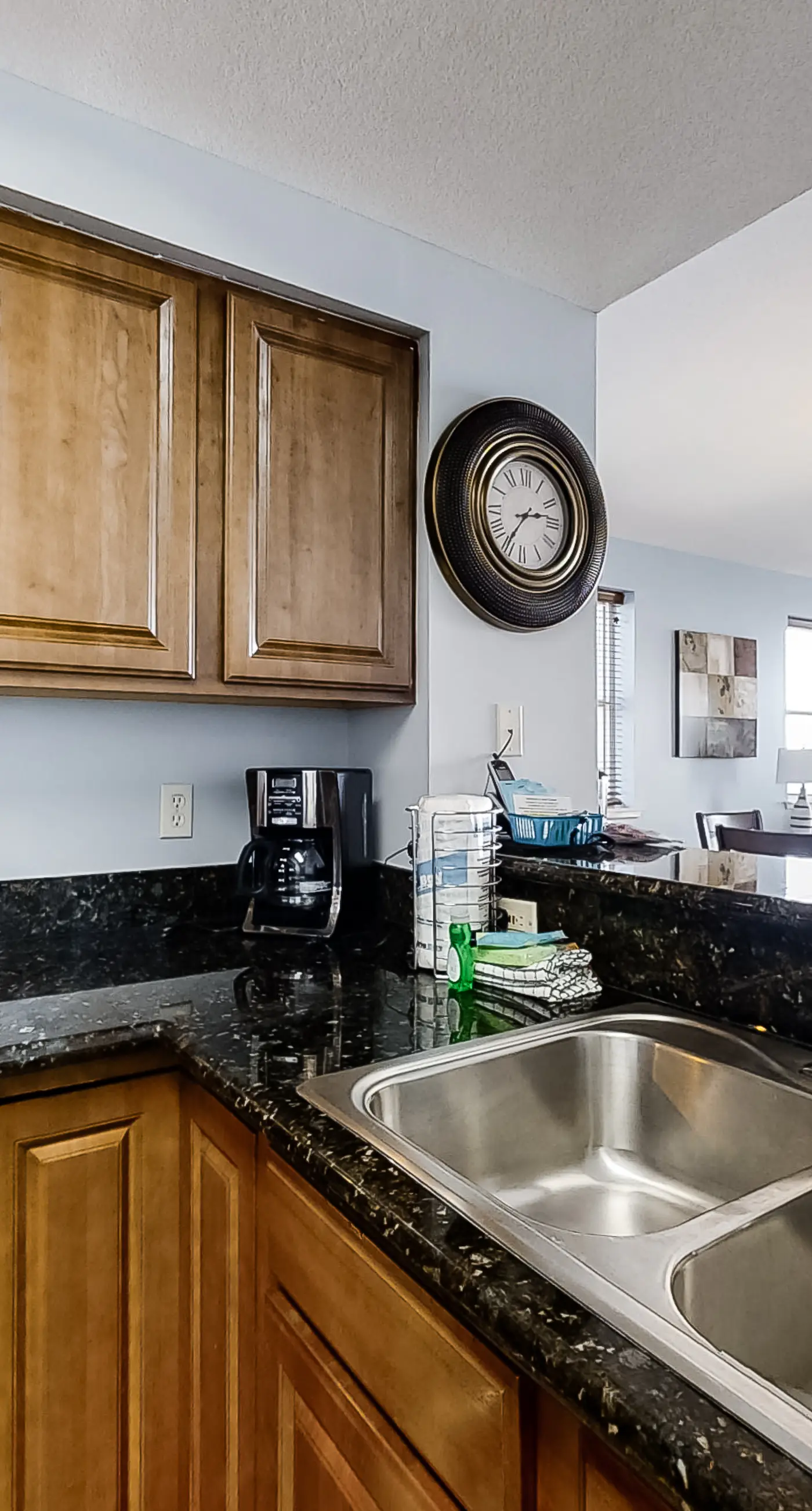 Spacious 18th-floor condo with furnished balcony, shared heated pool, gym, & more