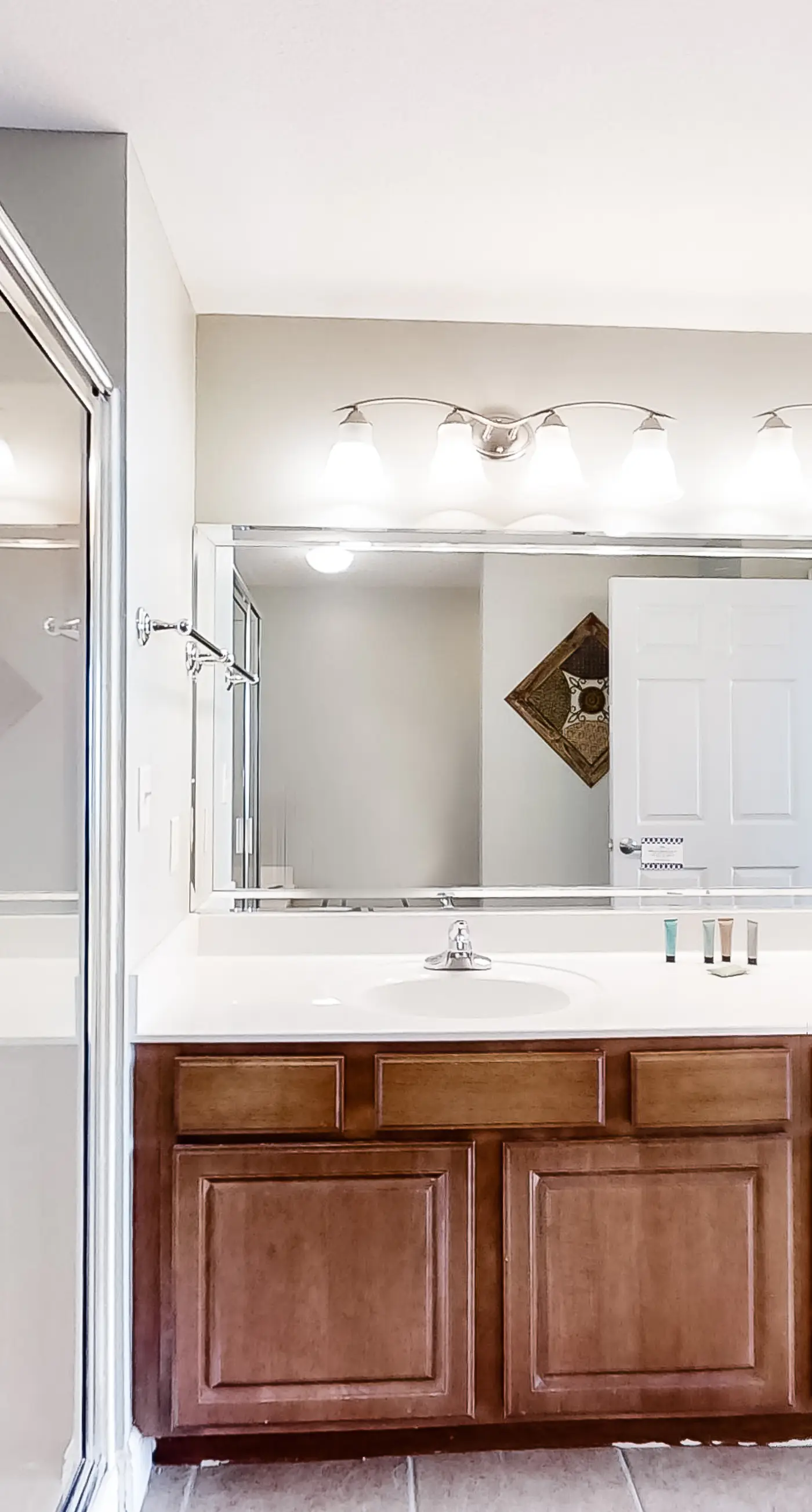 Spacious 18th-floor condo with furnished balcony, shared heated pool, gym, & more