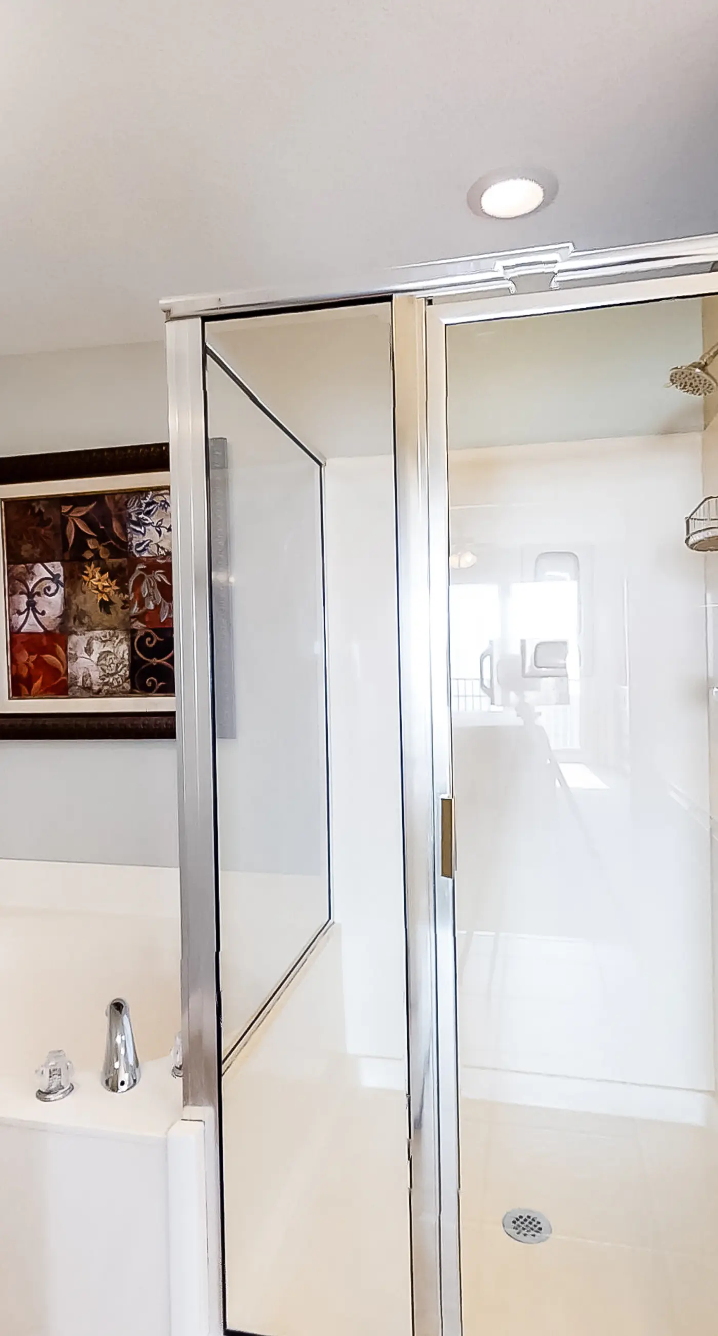 Spacious 18th-floor condo with furnished balcony, shared heated pool, gym, & more