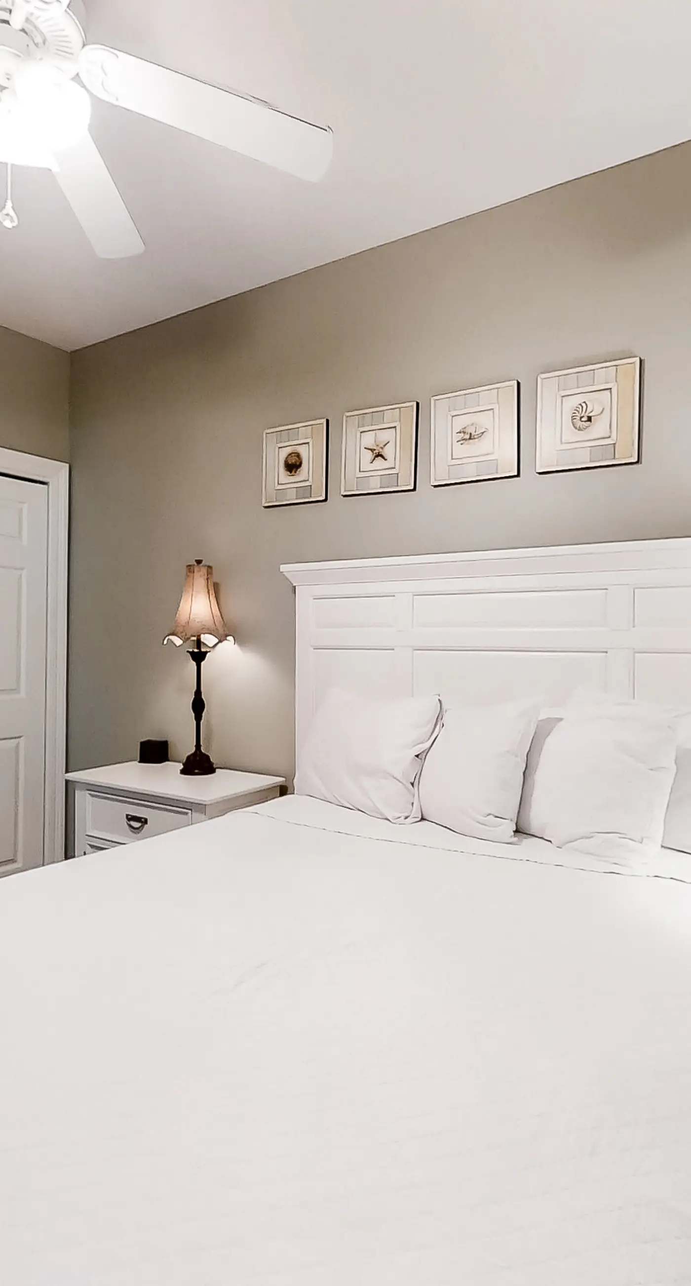 Spacious 18th-floor condo with furnished balcony, shared heated pool, gym, & more