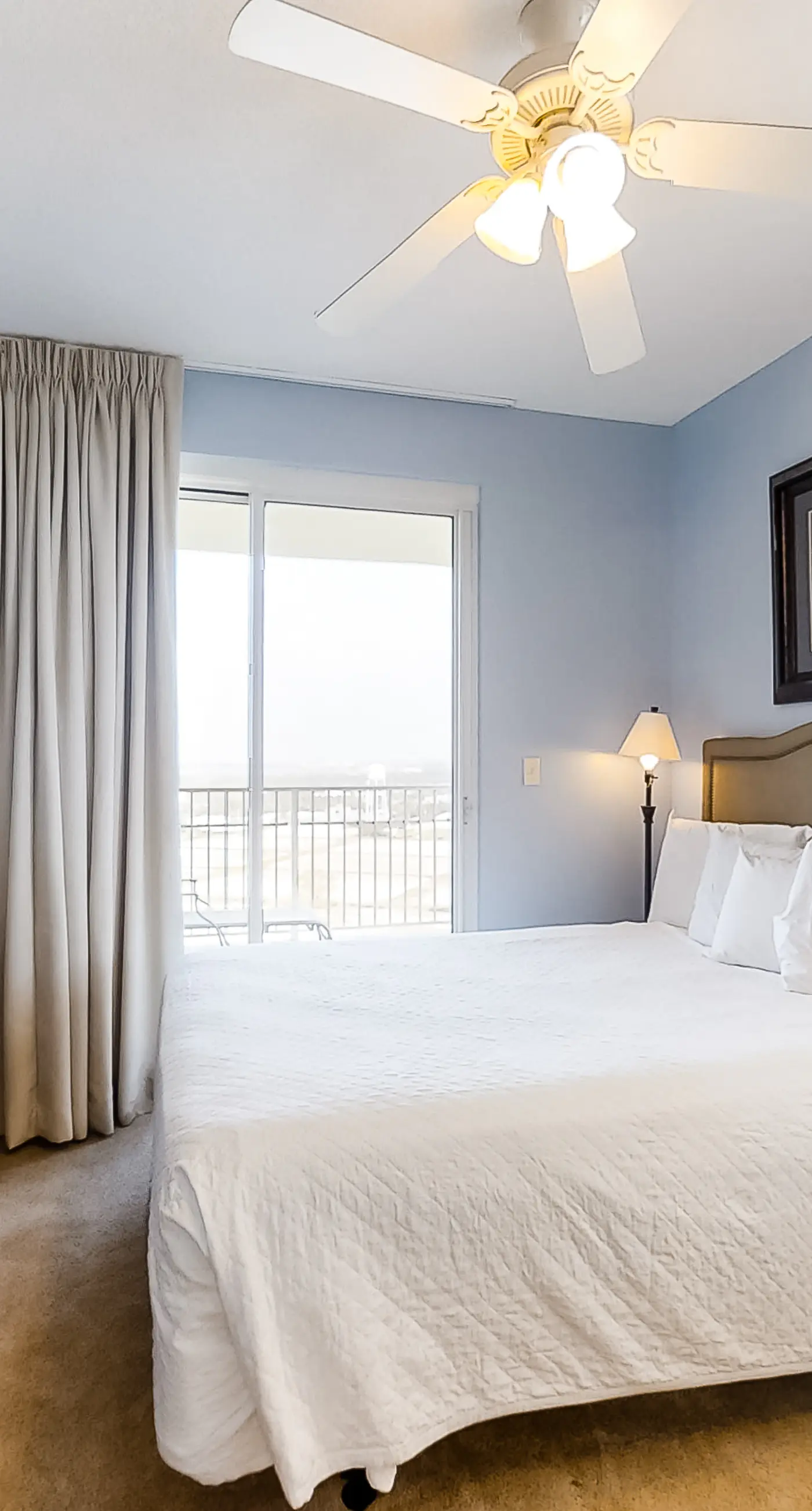 Spacious 18th-floor condo with furnished balcony, shared heated pool, gym, & more