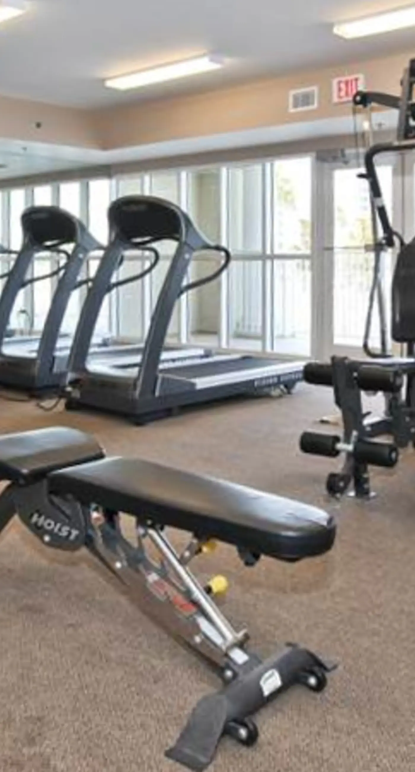 Spacious 18th-floor condo with furnished balcony, shared heated pool, gym, & more