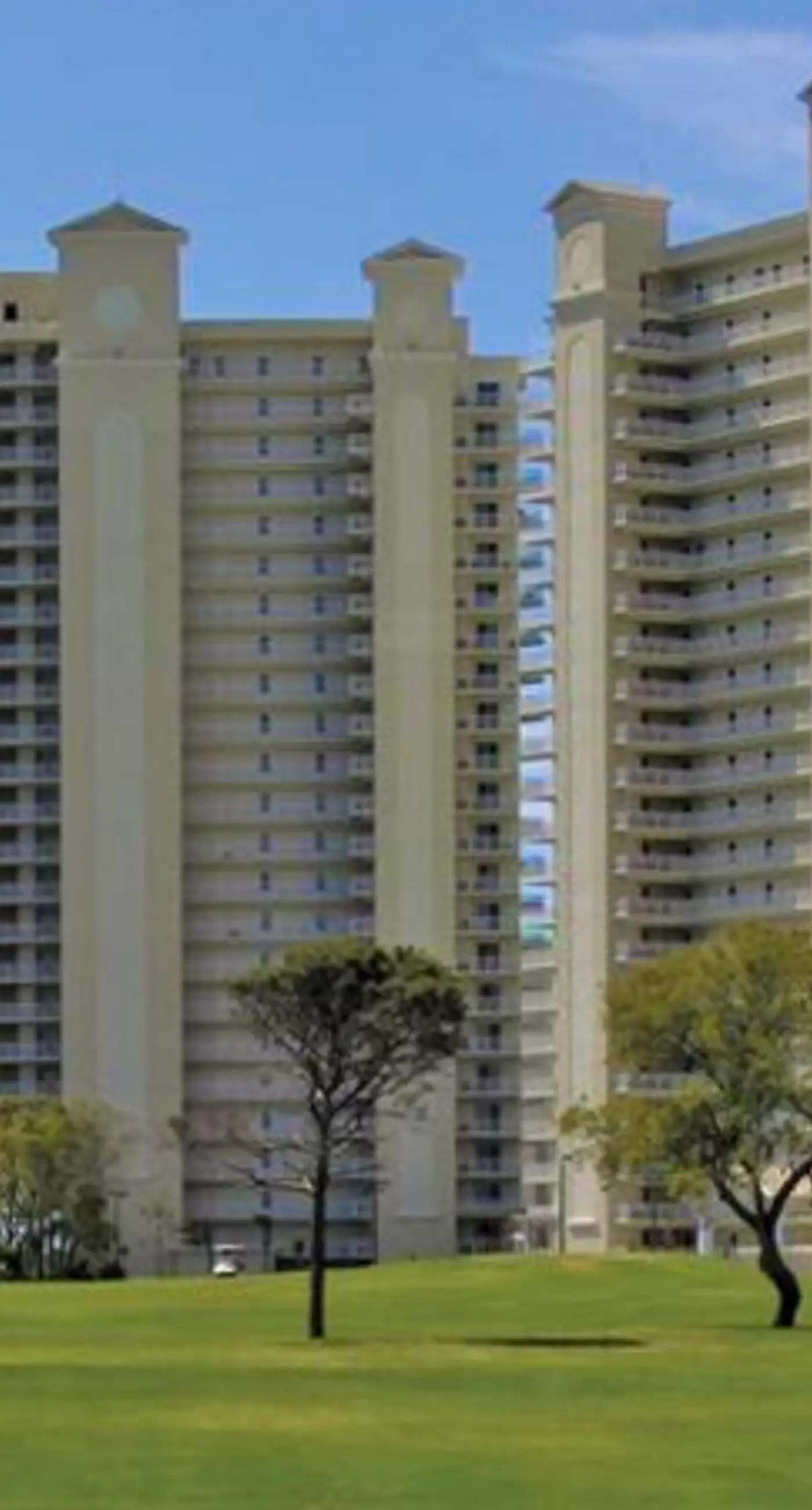 Spacious 18th-floor condo with furnished balcony, shared heated pool, gym, & more