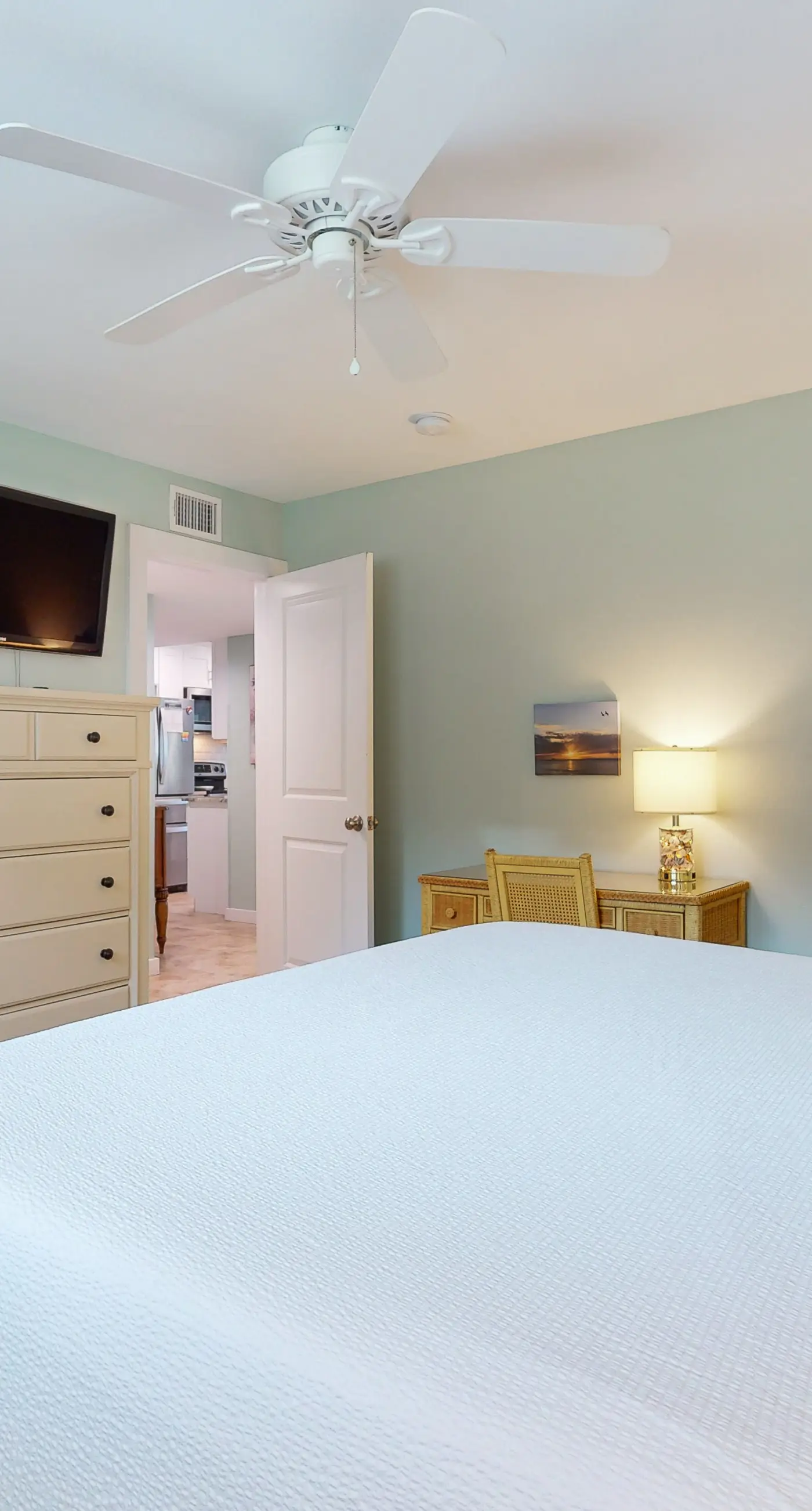 Sunny condo with lake views, outdoor pool, fast WiFi, tennis & central AC