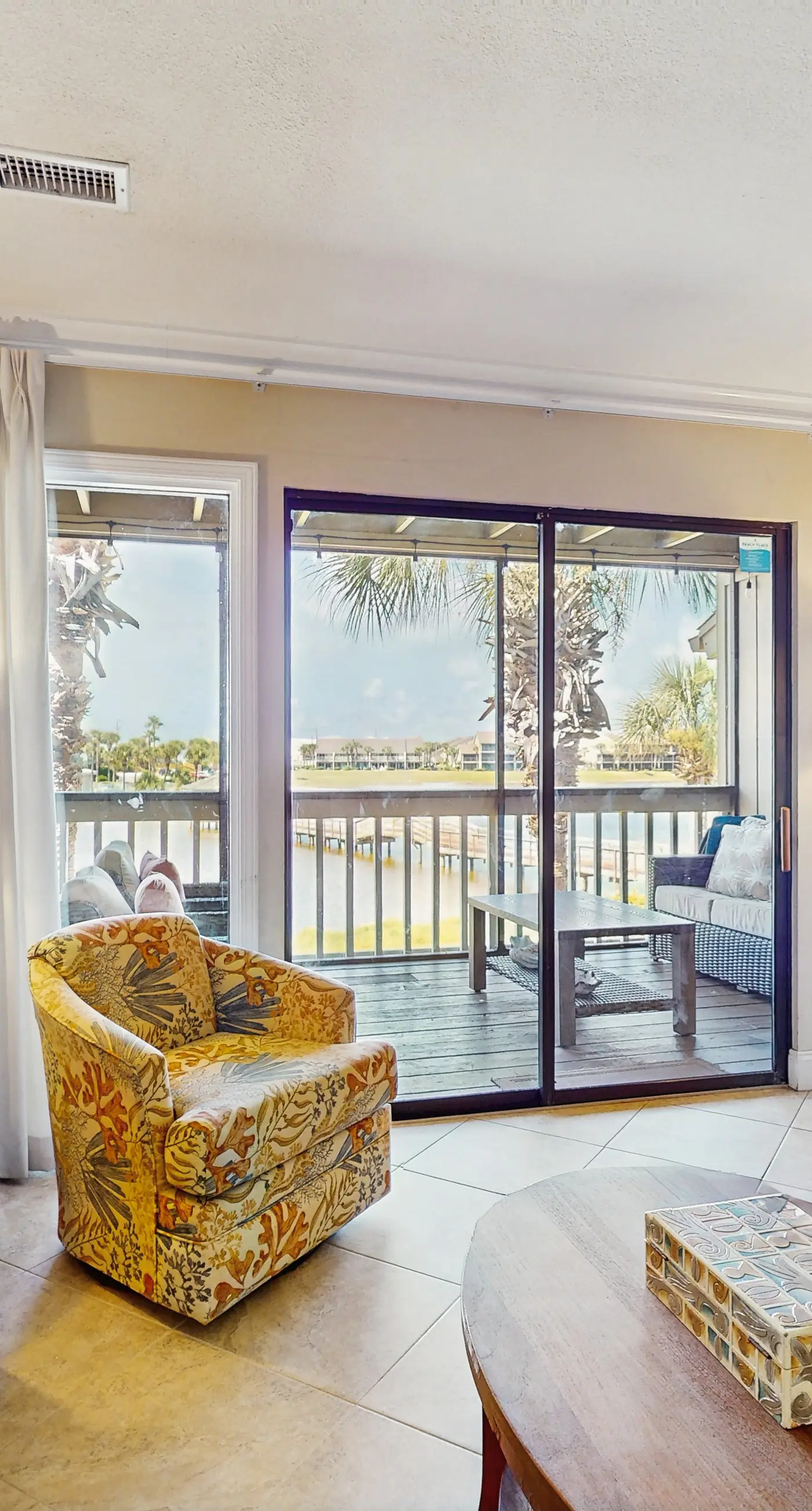 Lakefront condo near the beach with shared pool & two balconies - snowbird friendly