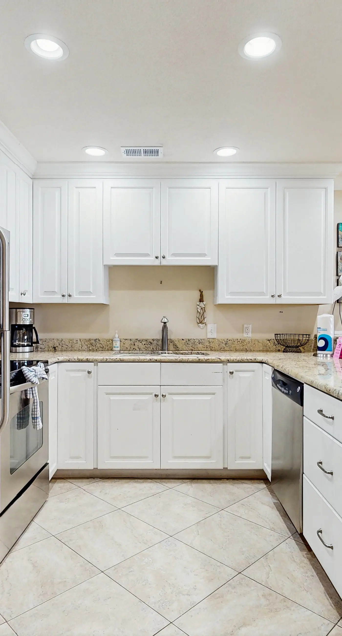Lakefront condo near the beach with shared pool & two balconies - snowbird friendly