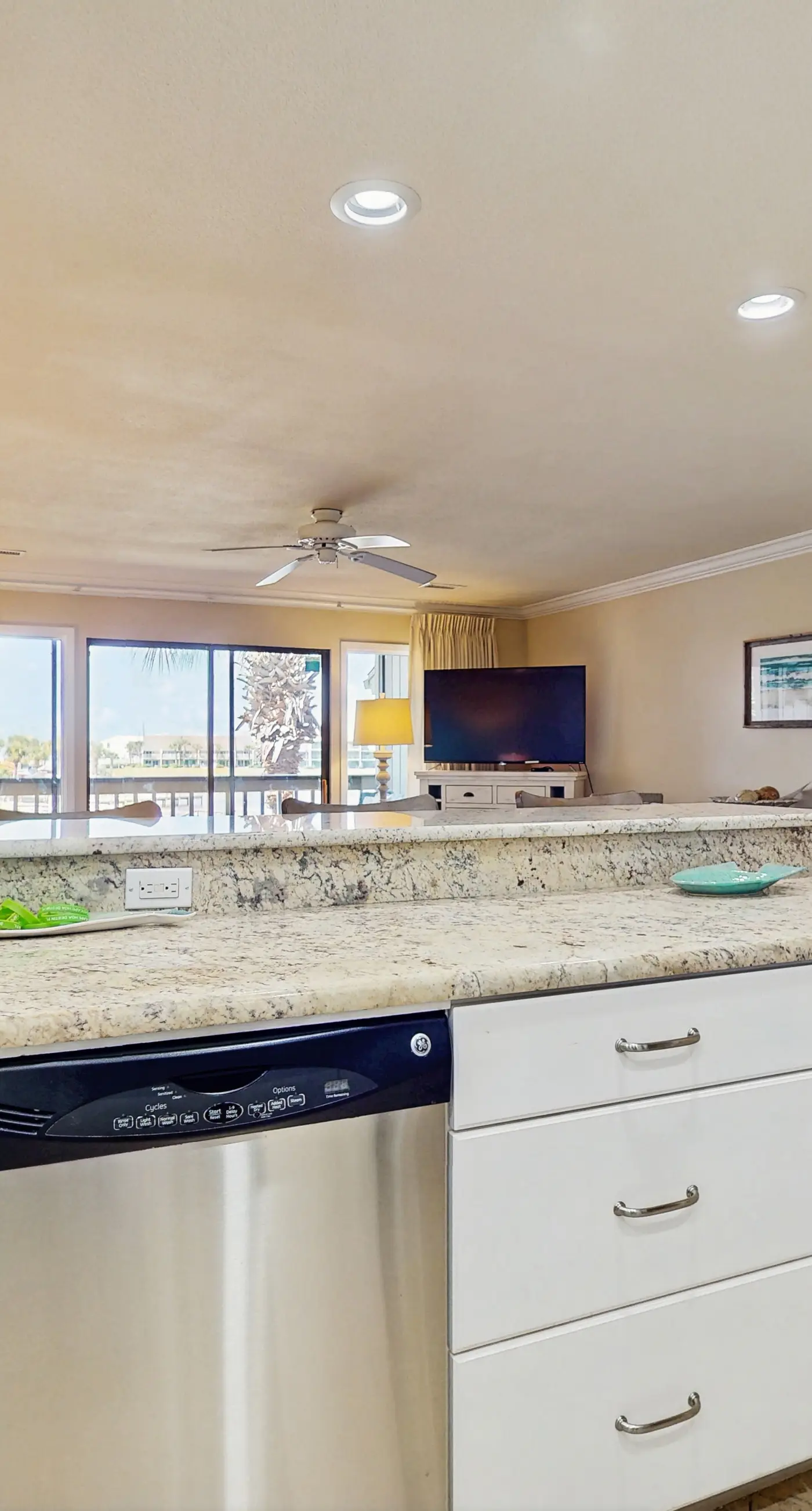 Lakefront condo near the beach with shared pool & two balconies - snowbird friendly