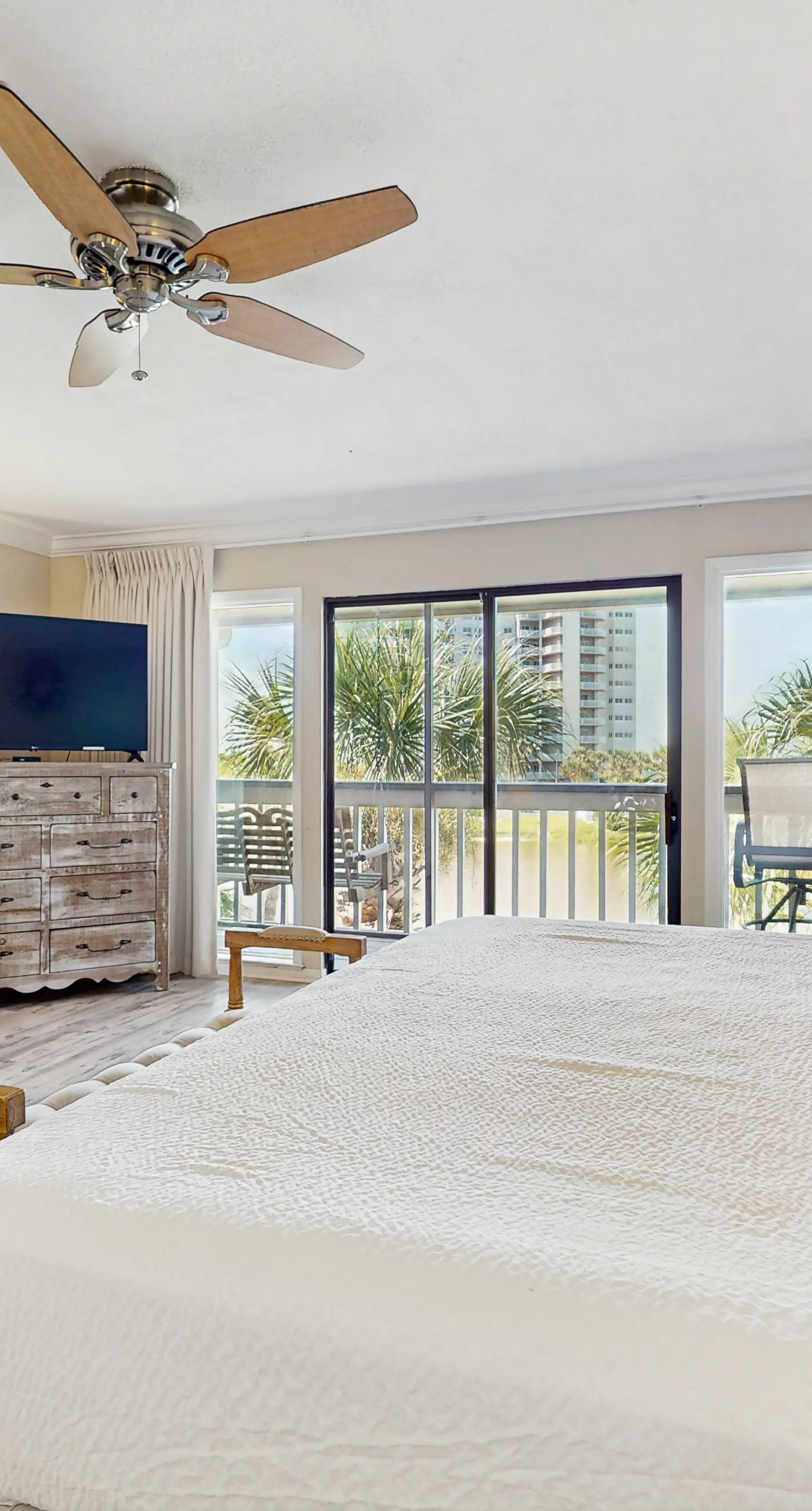 Lakefront condo near the beach with shared pool & two balconies - snowbird friendly