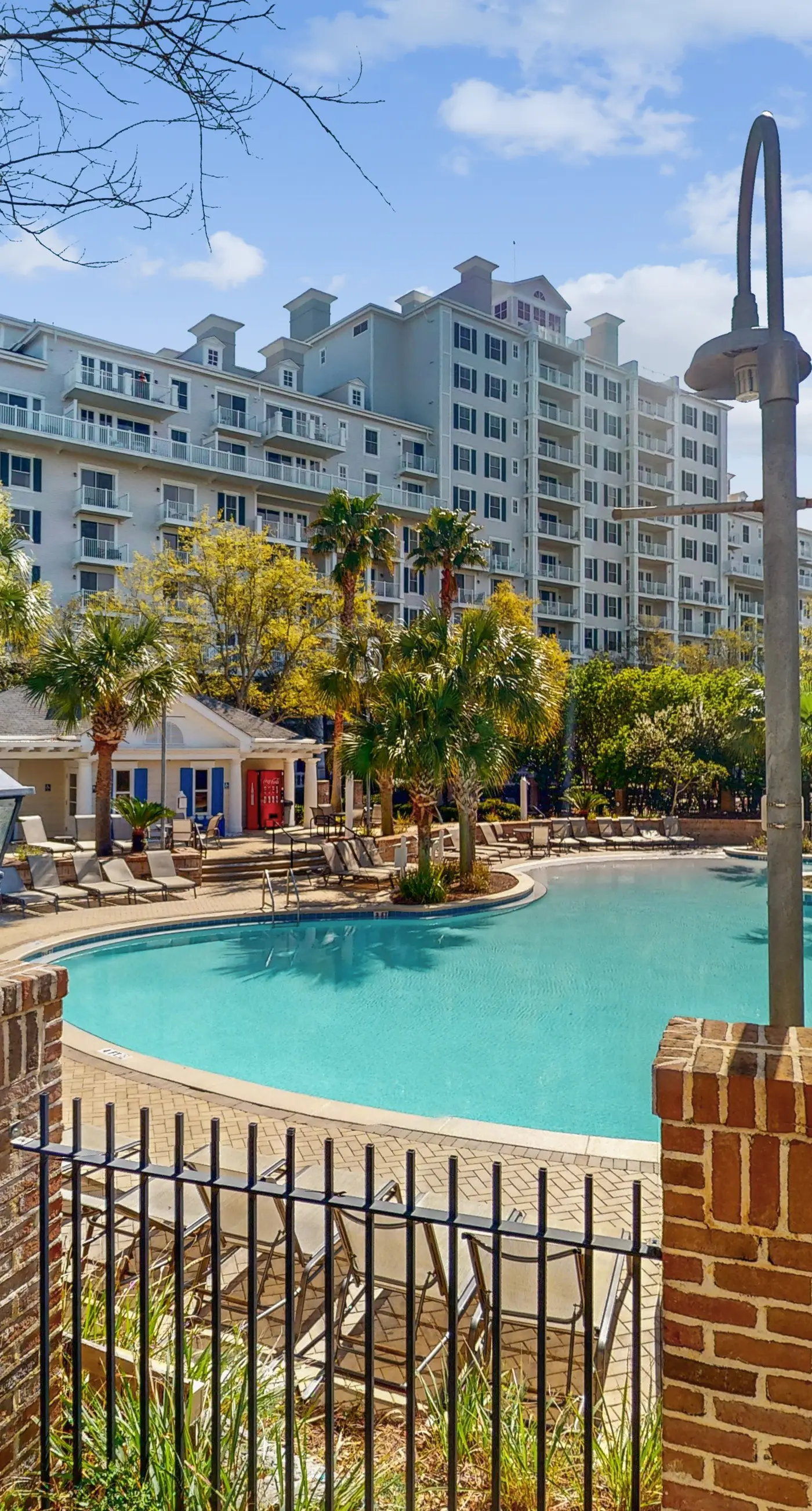 2nd-floor resort condo with balcony, on-site pool, golf, tennis & beach access