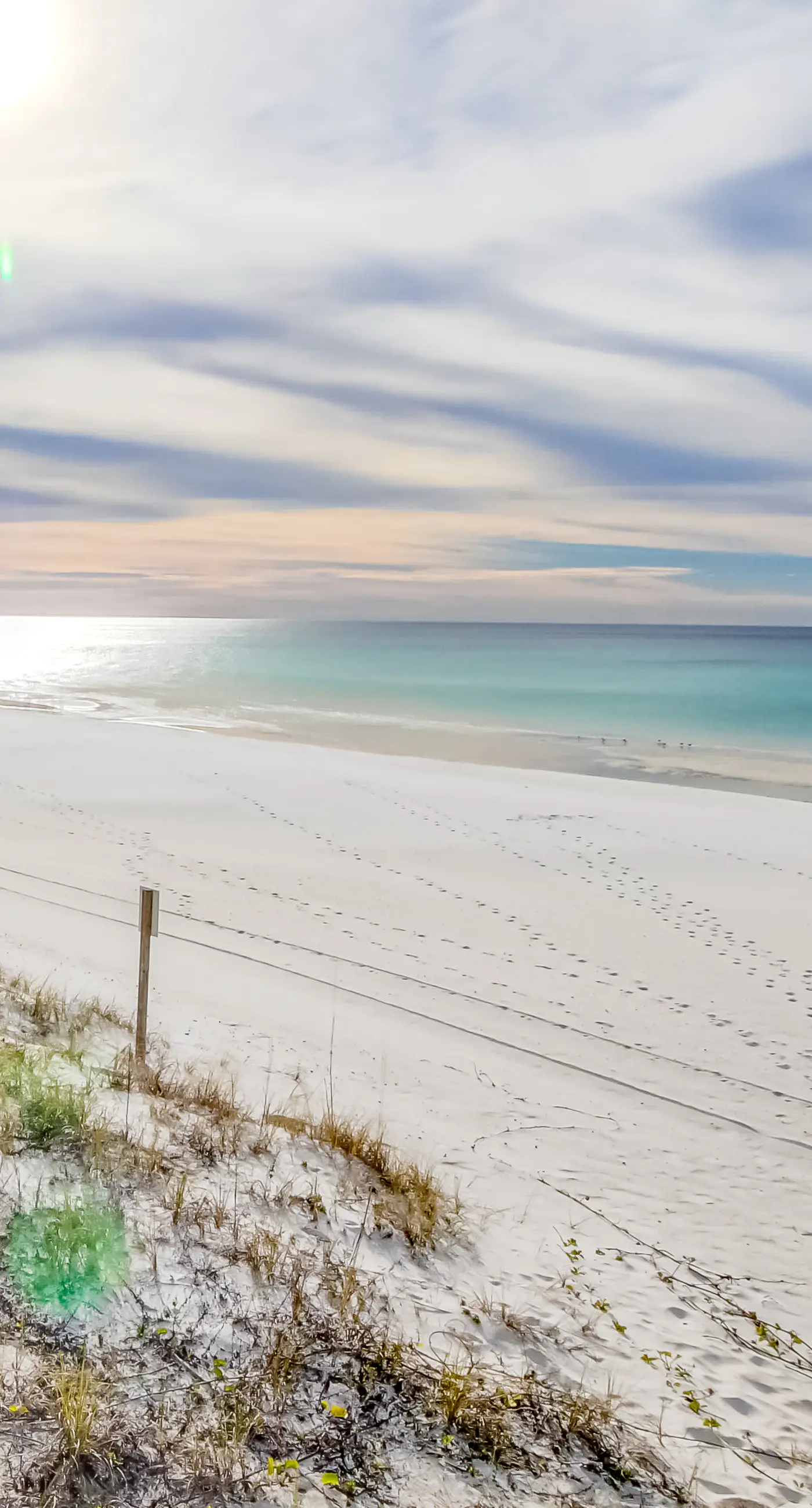 2nd-floor resort condo with balcony, on-site pool, golf, tennis & beach access