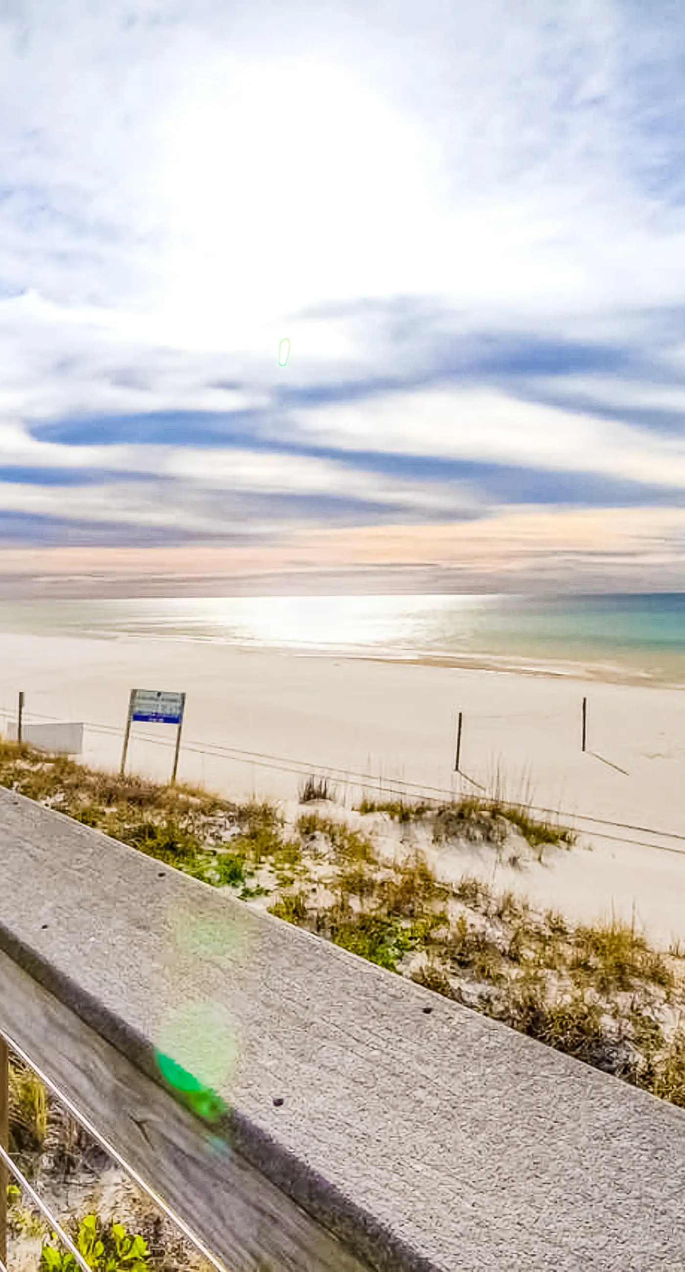 2nd-floor resort condo with balcony, on-site pool, golf, tennis & beach access