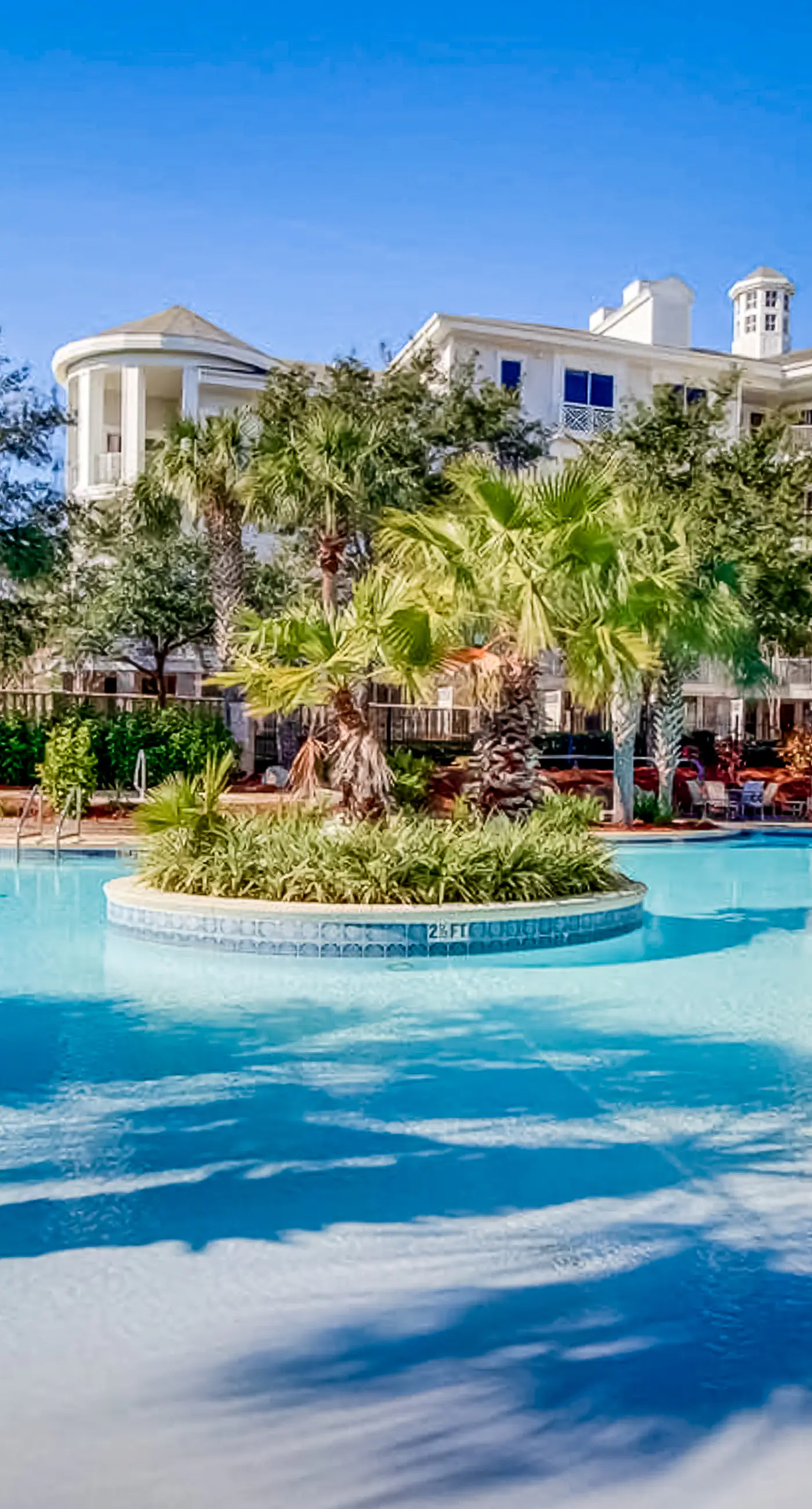 2nd-floor resort condo with balcony, on-site pool, golf, tennis & beach access