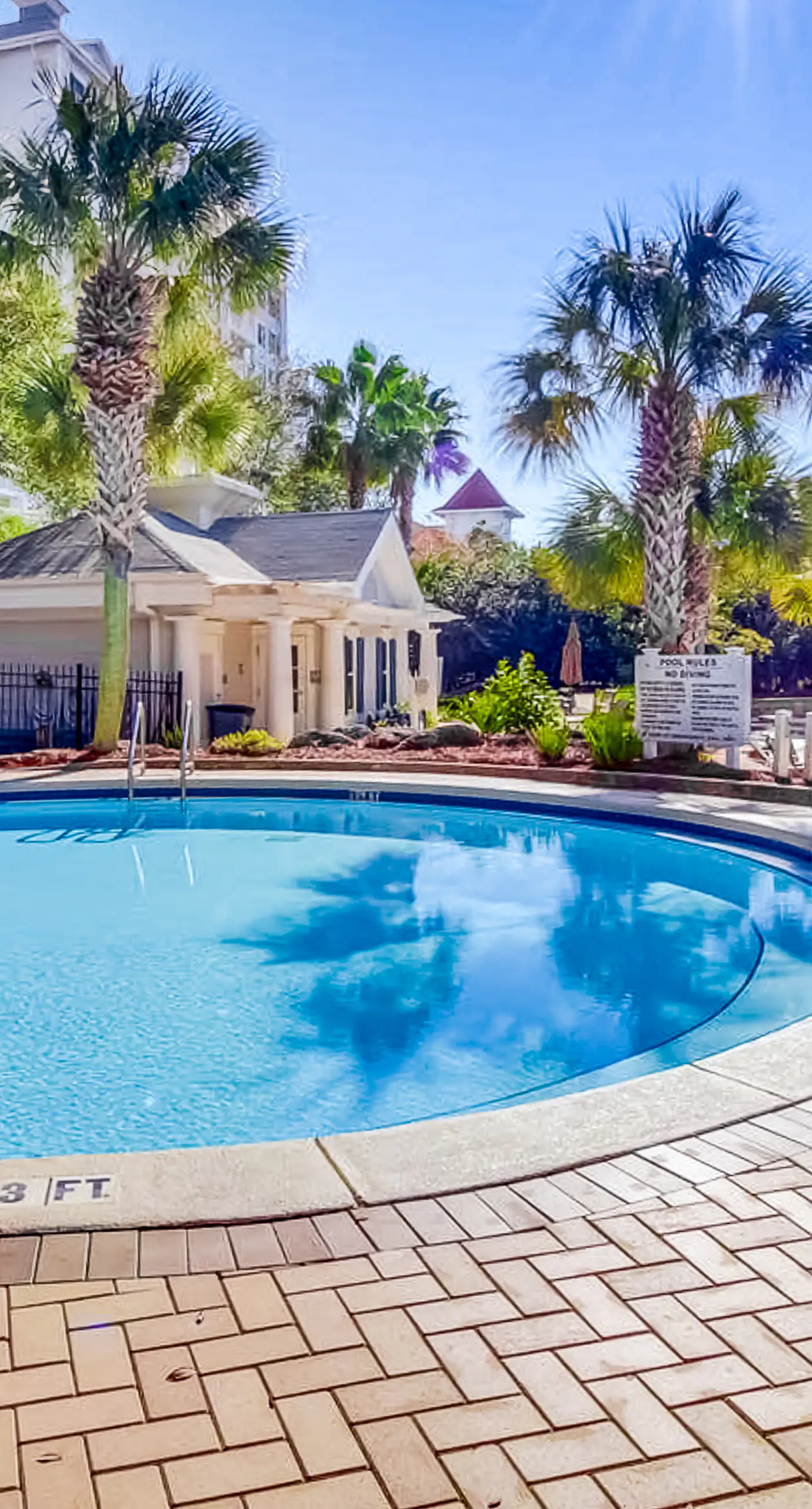 2nd-floor resort condo with balcony, on-site pool, golf, tennis & beach access