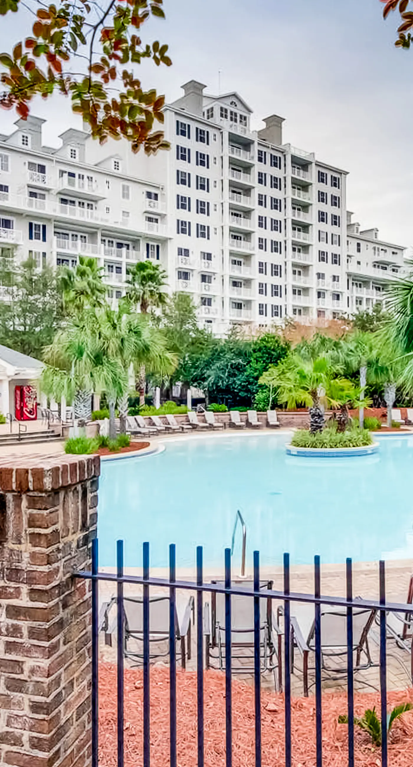 2nd-floor resort condo with balcony, on-site pool, golf, tennis & beach access